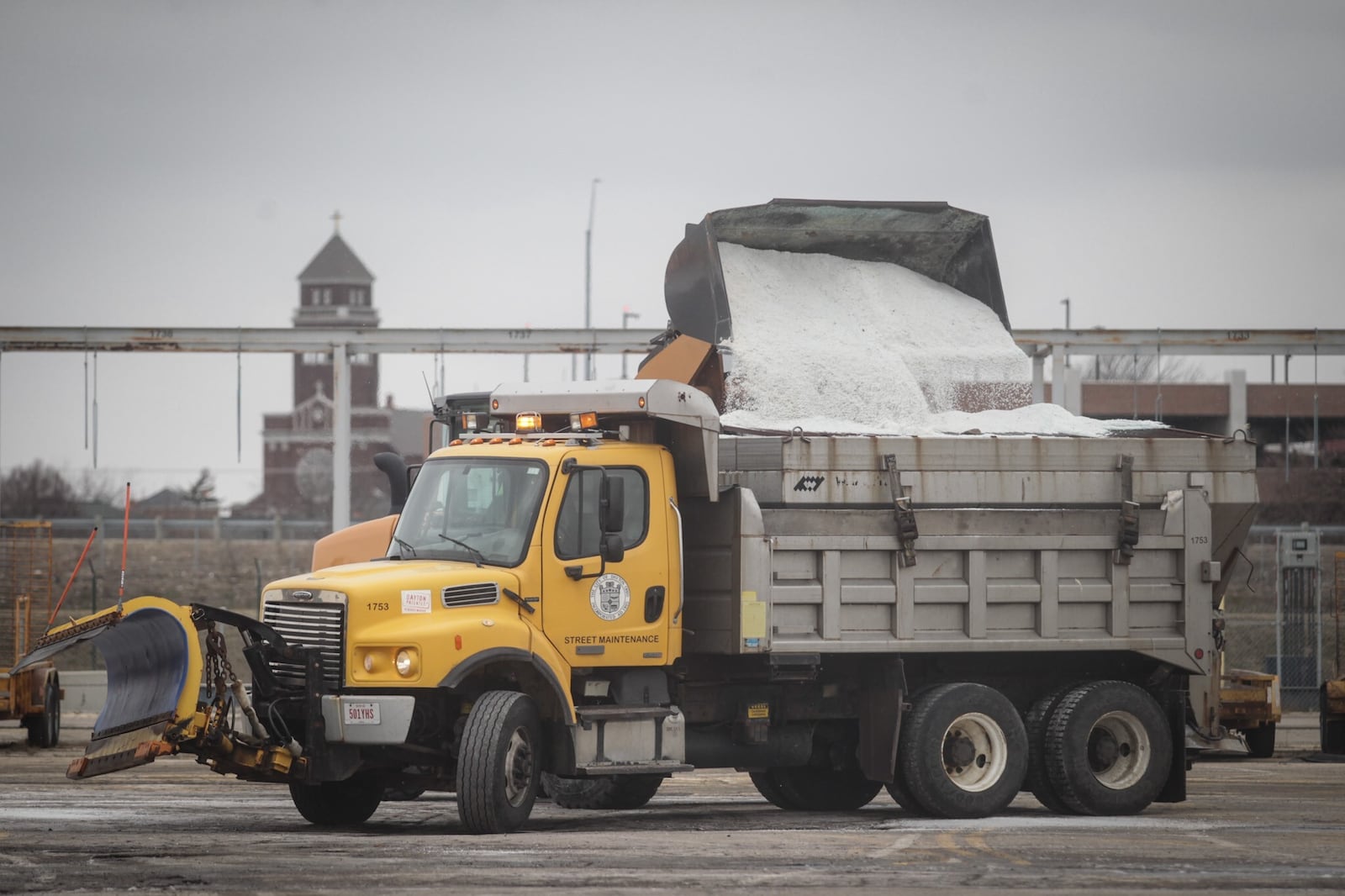 The Dayton salt barn was busy Thursday afternoon, Jan. 28, 2021, in preparation for a weekend snowstorm. JIM NOELKER/STAFF