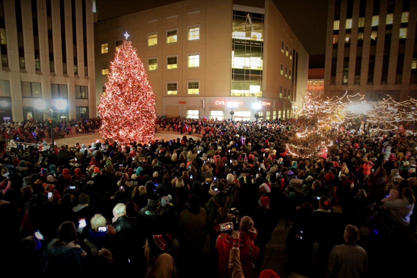 Crowds gathered for the Grande Illumination of the Christmas tree Friday night, Nov. 25, 2016, during the 2016 Dayton Holiday Festival on Courthouse Square in downtown Dayton.