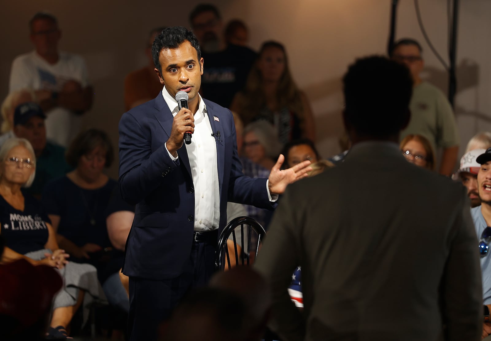 A man asks a question for  former presidential candidate Vivek Ramaswamy during a town hall meeting at the Bushnell Banquet Center in Springfield Thursday, Sept. 19, 2024. BILL LACKEY/STAFF