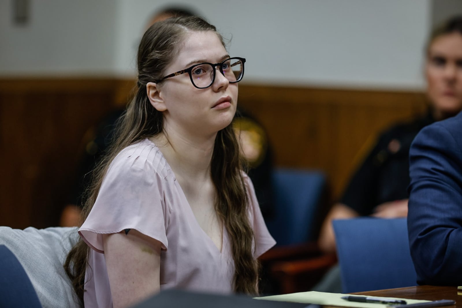 Abby Michaels sits in Montgomery County Common Pleas Judge Steven Dankof's courtroom in Dayton, Ohio, at the opening of her trial Monday, June 5, 2023. Michaels is accused of killing three members of a family from Mason during a wrong-way crash on Interstate 75 on St. Patrick's Day 2019. JIM NOELKER/STAFF