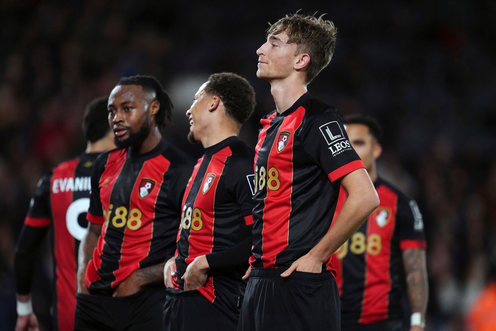 Bournemouth's Dean Huijsen, front, celebrates scoring the opening goal during the English Premier League soccer match between AFC Bournemouth and Tottenham Hotspur in Bournemouth, England, Thursday, Dec. 5, 2024. (Adam Davy/PA via AP)