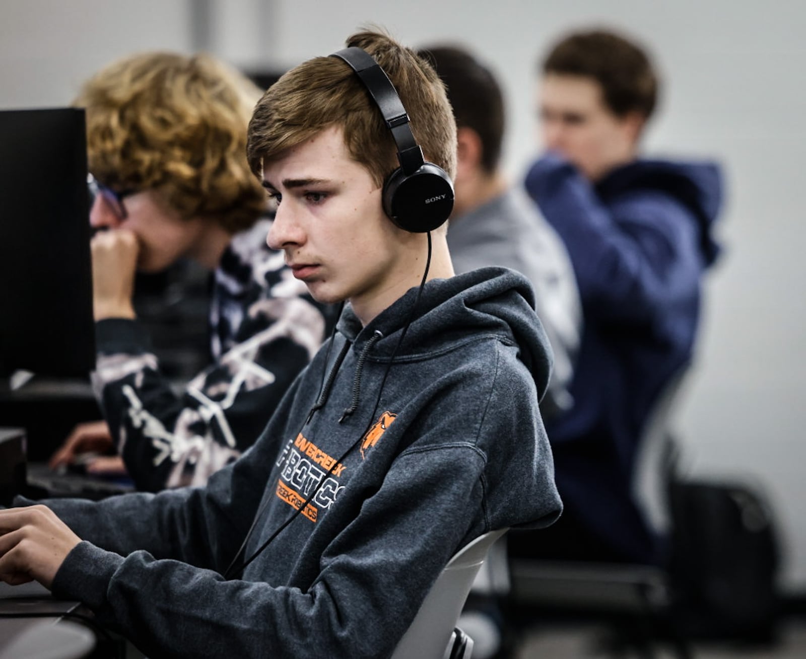 Beavercreek High School sophomore   Justin Larollo studies in the district's new computer science career tech class Thursday November 21, 2024. JIM NOELKER/STAFF