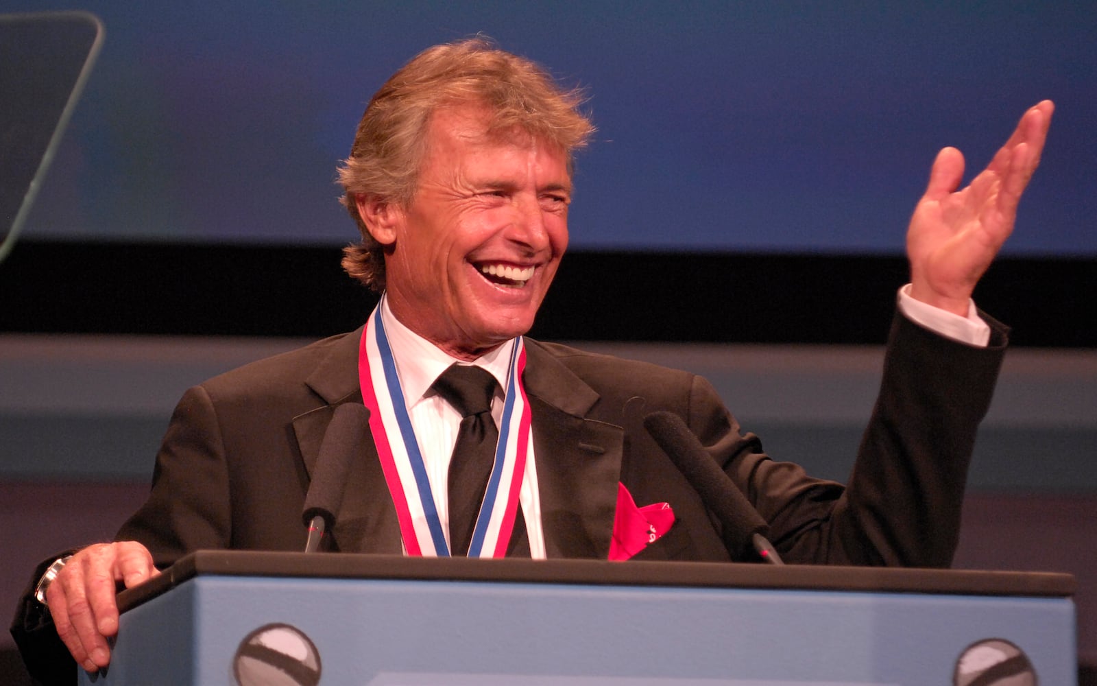 Sean D. Tucker speaks at his induction into the National Aviation Hall of Fame at the Dayton Convention Center on Saturday.  Staff photo by Dave Munch