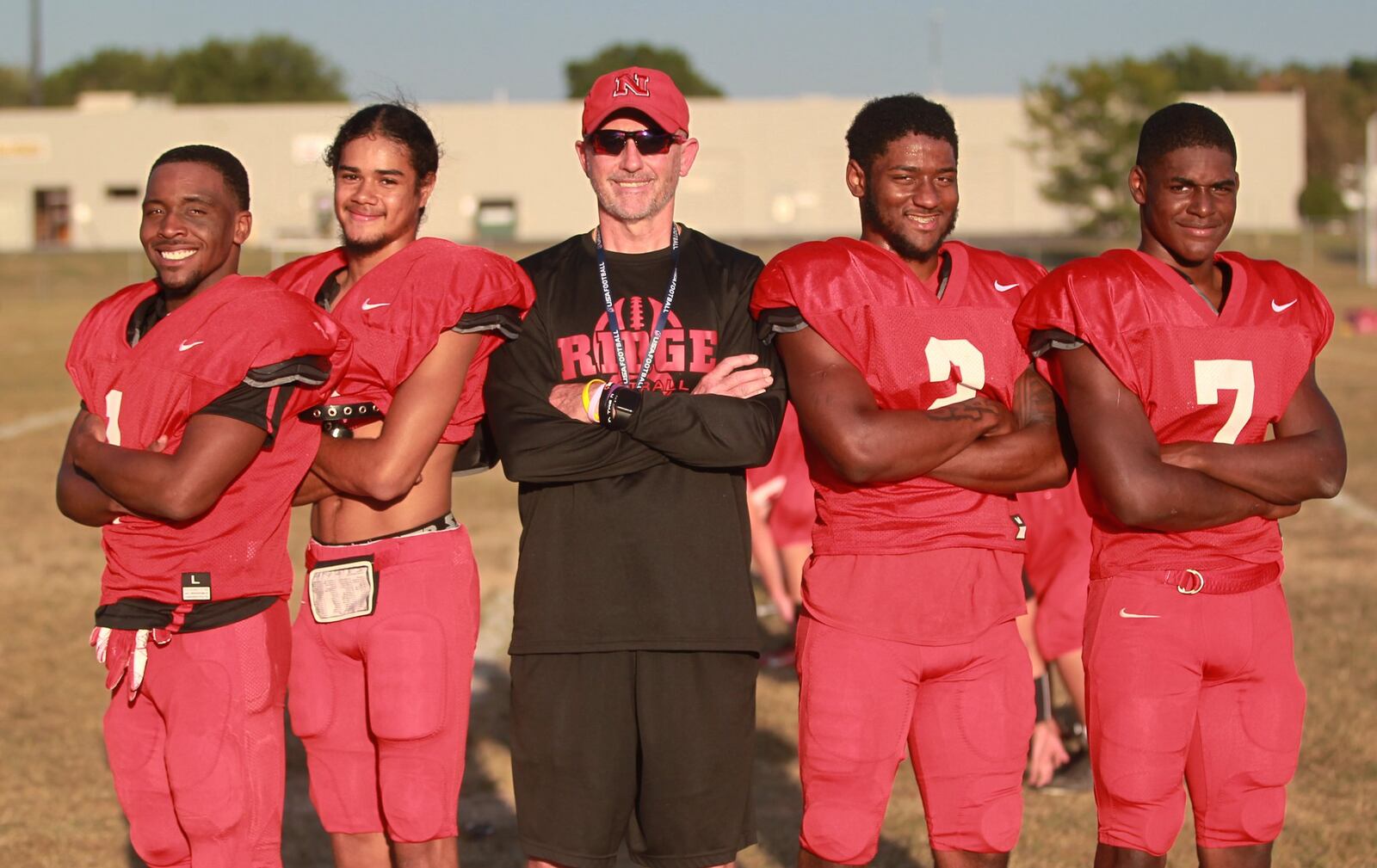 Veteran Northridge High School football coach Bob Smith (middle) has guided the Polar Bears to a 3-0 start, featuring seniors Jerron Lander (left), Darryl Story Jr., Shawn Shehee and junior Matt Moon. MARC PENDLETON / STAFF