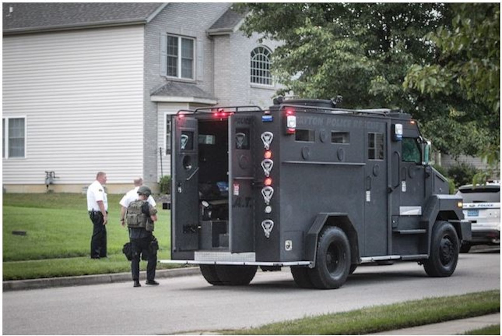 Dayton Police SWAT and a police Hostage Negotiation Team were sent to a home on Larch Tree Court on Friday to deal with a standoff. (Jim Noelker/Staff)