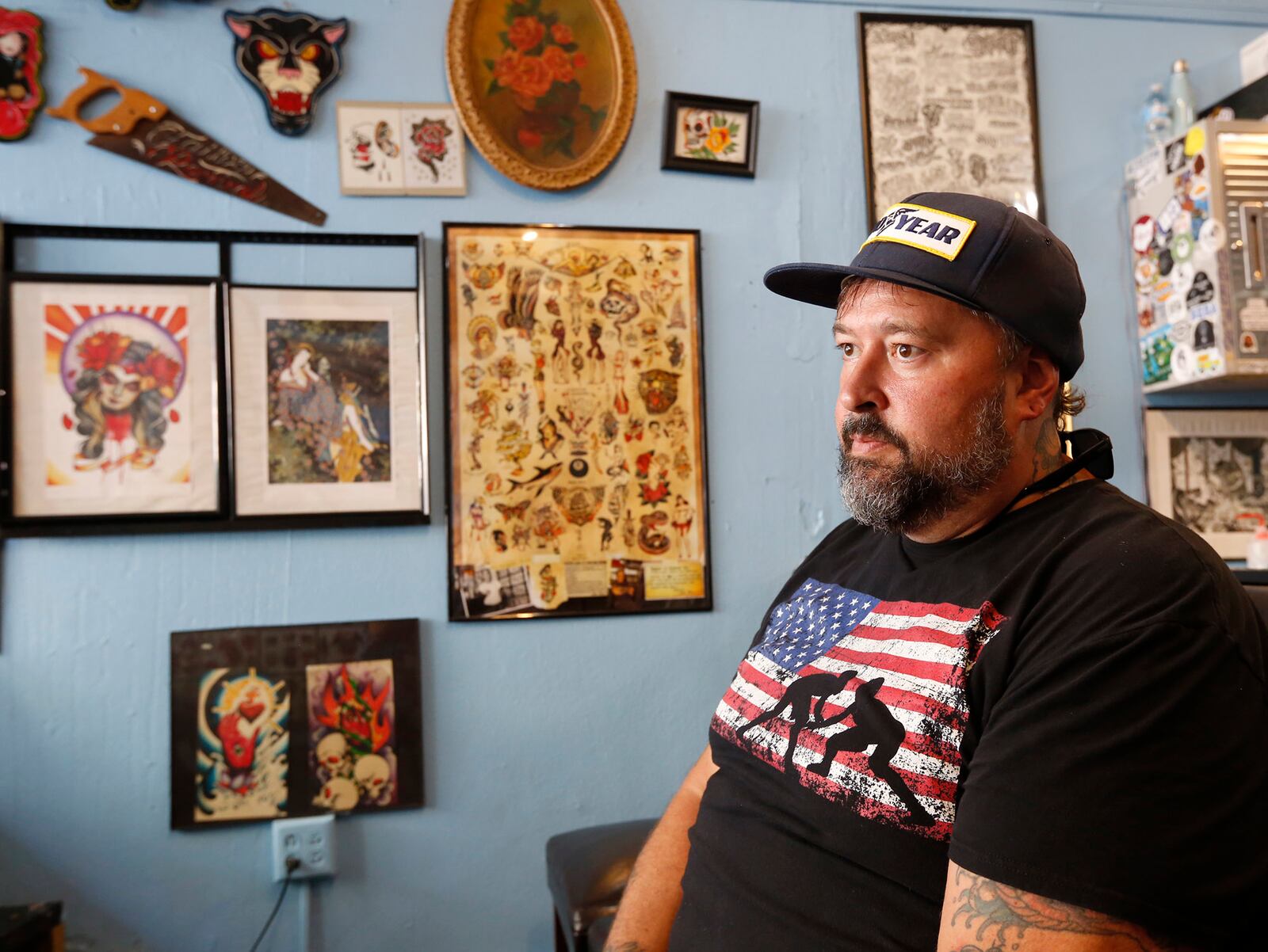 Gem City Tattoo owner Jim Collins talks about the affects of the mass shooting in the Oregon District.  TY GREENLEES / STAFF