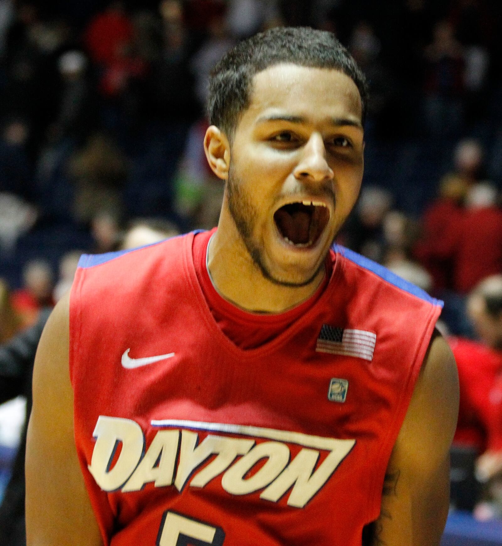 Dayton forward Devin Oliver celebrates after his game-winning 3-pointer against Ole Miss with 0.3 to play in overtime on Saturday, Jan. 4, 2014, in Oxford, Miss. David Jablonski/Staff