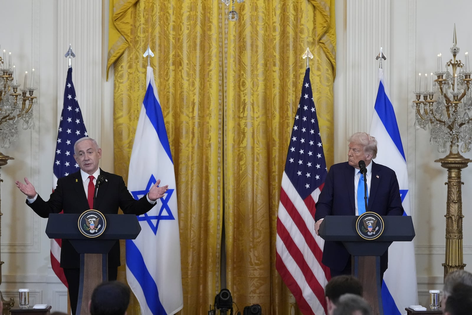 Israeli Prime Minister Benjamin Netanyahu answers questions during a news conference with President Donald Trump in the East Room of the White House, Tuesday, Feb. 4, 2025, in Washington. (AP Photo/Alex Brandon)