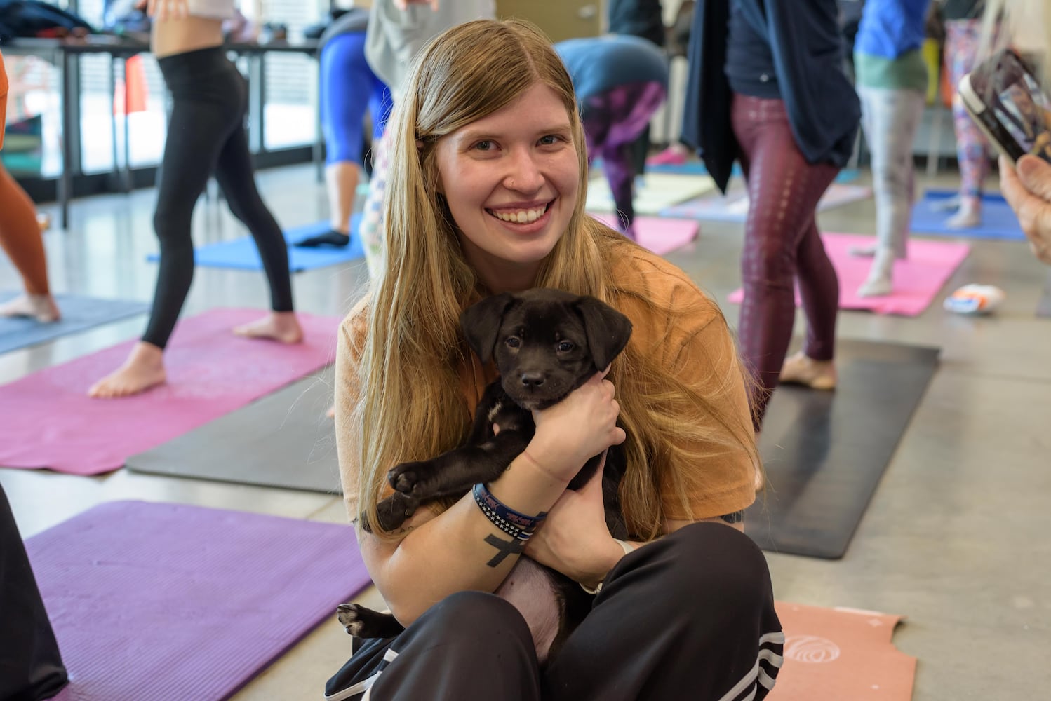 PHOTOS: Puppy Yoga at SICSA Pet Adoption and Wellness Center