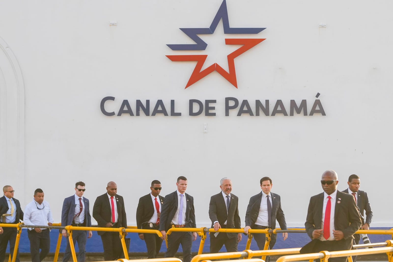 U.S. Secretary of State Marco Rubio, third from right, tours the Miraflores locks at the Panama Canal in Panama City, Sunday, Feb. 2, 2025. (AP Photo/Mark Schiefelbein, Pool)