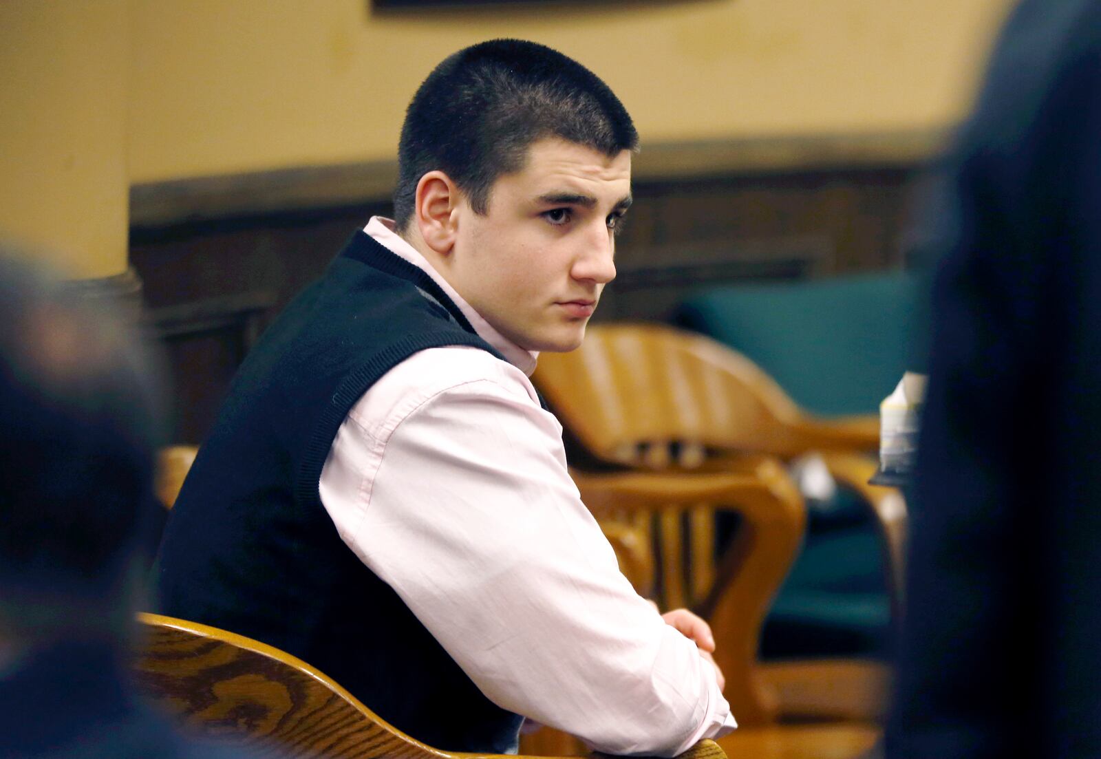 FILE - In a March 16, 2013 photo, Trent Mays, 17, sits in the court room during a break on the fourth day of the juvenile trial for he and co-defendant Ma’lik Richmond, 16, on rape charges in juvenile court in Steubenville, Ohio. Mays, convicted of raping a West Virginia girl following an alcohol-fueled party, was released from juvenile detention on Tuesday, Jan. 6, 2015.. (AP Photo/Keith Srakocic, Pool, File)