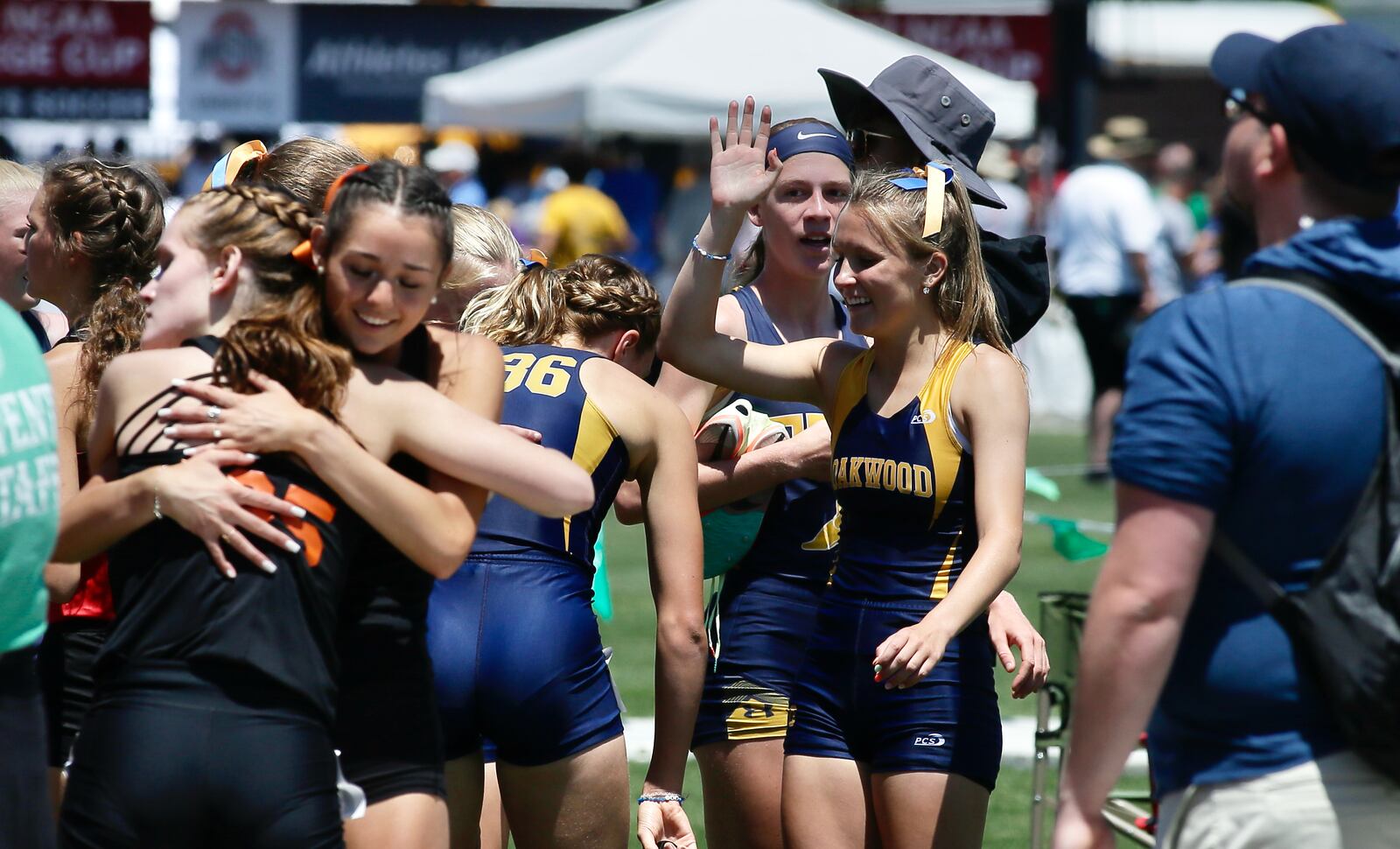 Oakwood celebrates after winning the 4x800-meter relay on Friday, June 3, 2022, in the Division II state track and field championships at Jesse Owens Memorial Stadium in Columbus. David Jablonski/Staff