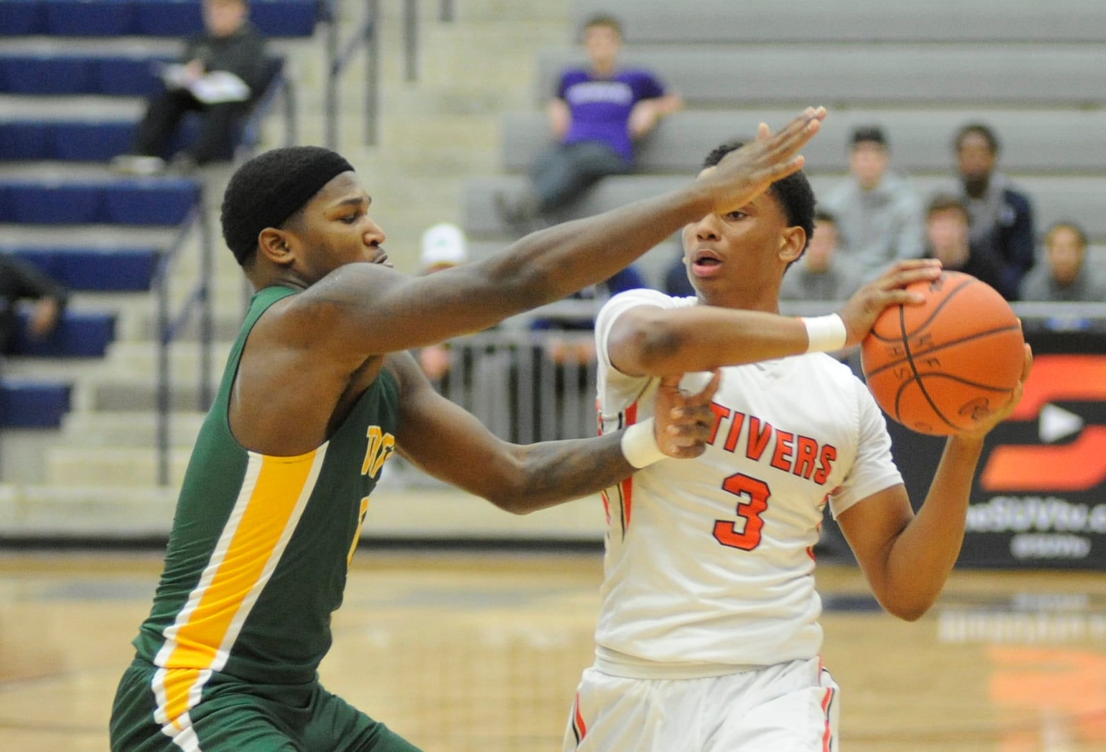 Trevon Ellis of Stivers (with ball) had 10 points. MARC PENDLETON / STAFF