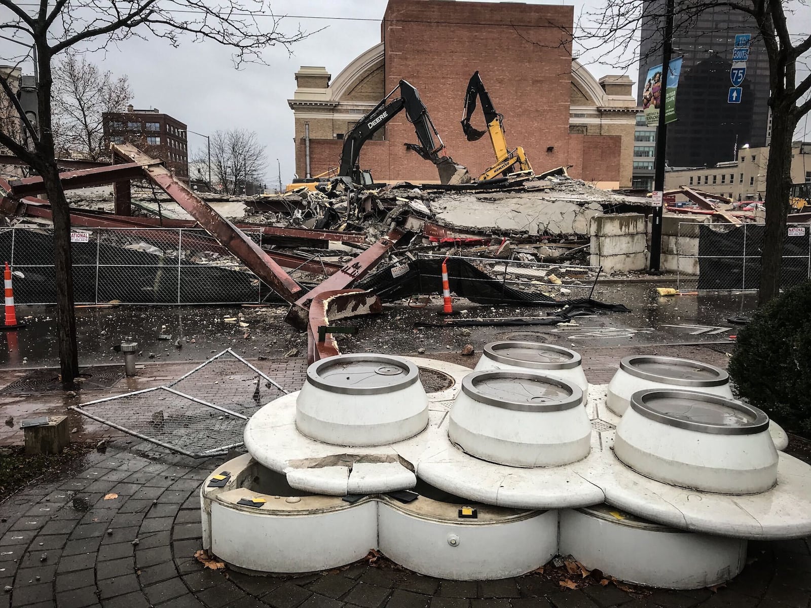 Demolition work did not go as planned Monday at the former Wright State University Kettering Center in downtown Dayton.Large metal beams, bricks, concrete and other building debris collapsed onto Monument Avenue, taking down RTA lines and heavily damaging a sculpture at RiverScape MetroPark across the street.