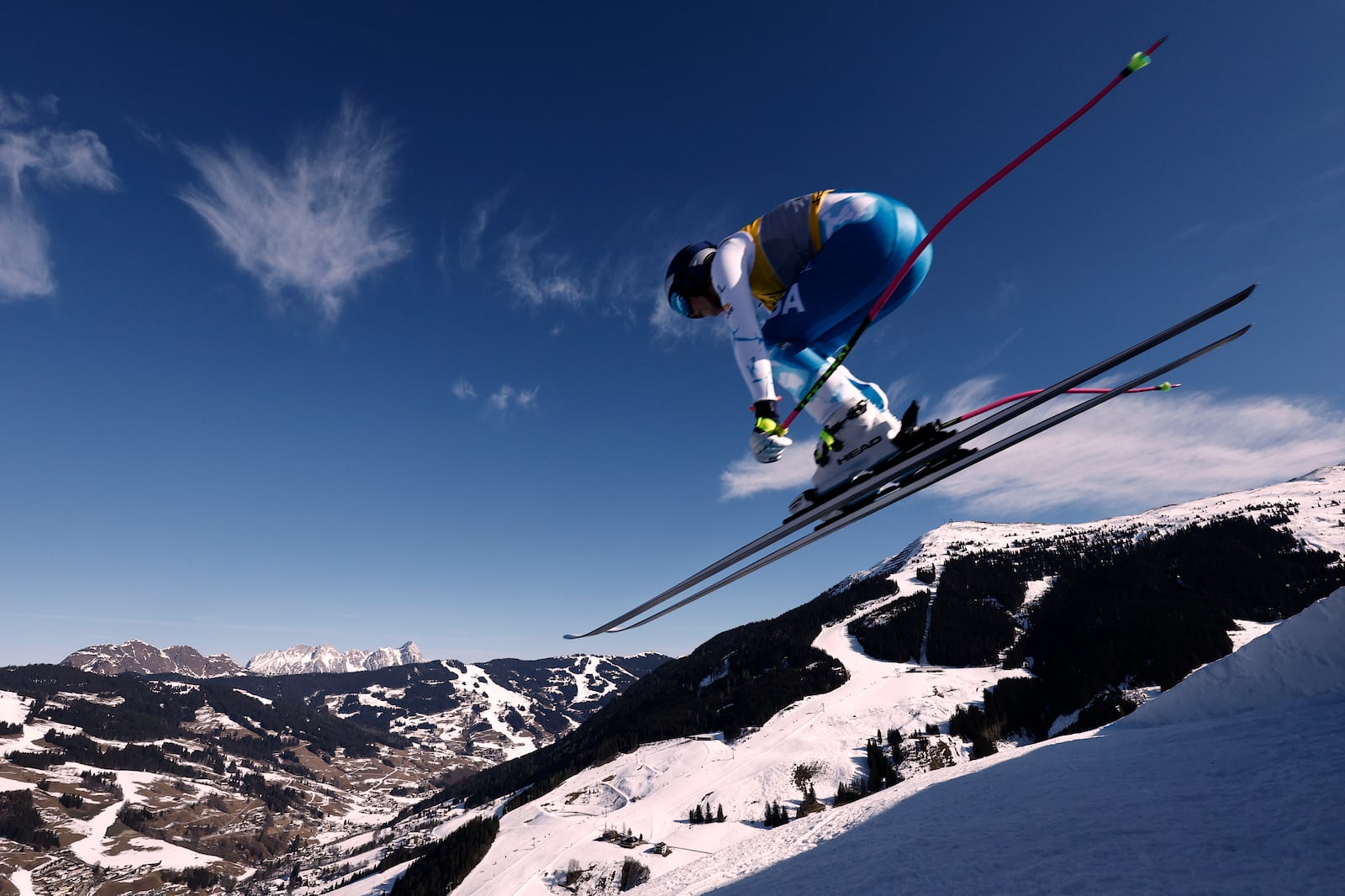 United States' Lindsey Vonn is airborne during a women's downhill race, at the Alpine Ski World Championships, in Saalbach-Hinterglemm, Austria, Saturday, Feb. 8, 2025. (AP Photo/Gabriele Facciotti)