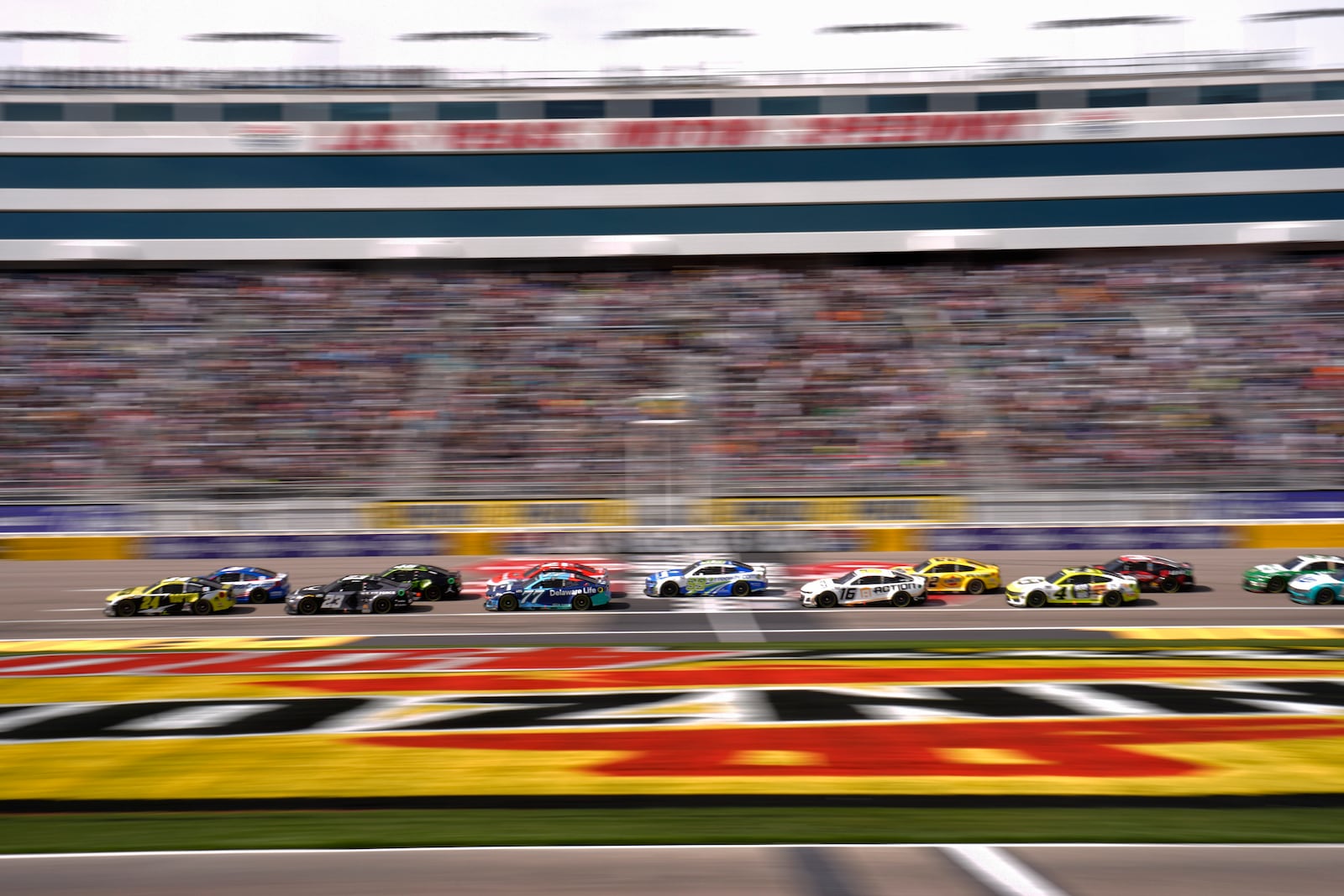 Drivers restart racing after a yellow flag during a NASCAR Cup Series auto race Sunday, March 16, 2025, in Las Vegas. (AP Photo/John Locher)