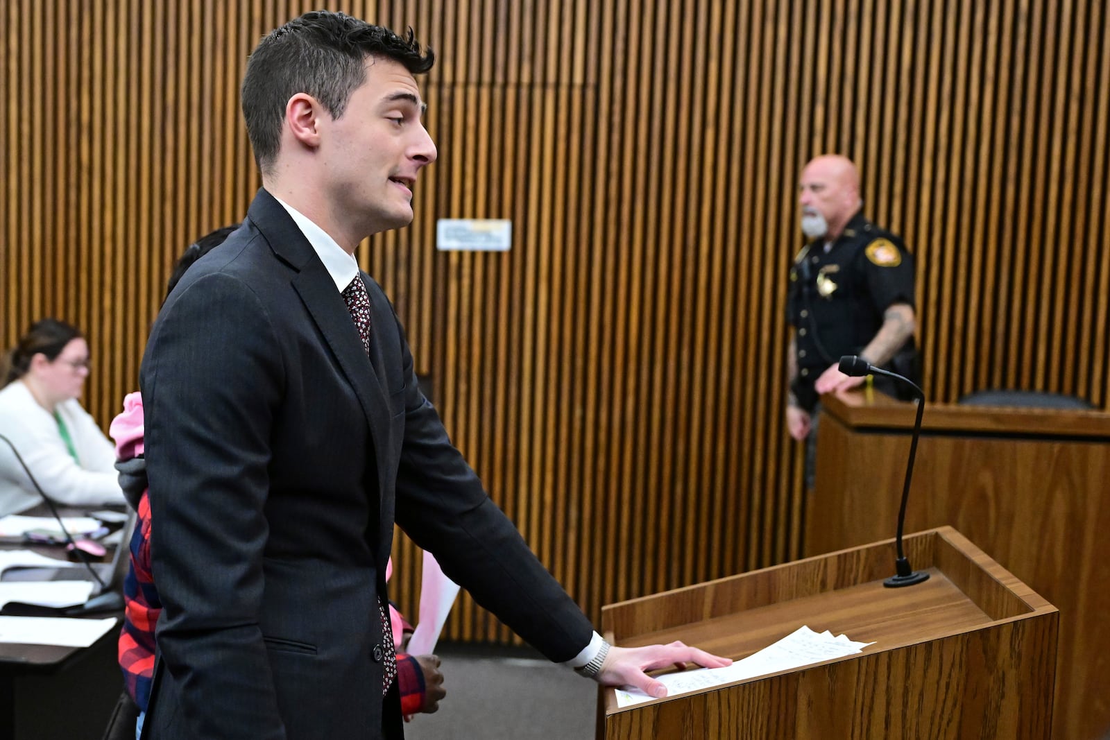 Public defender Jacob Margolis stands with Fiona Allen for her arraignment in Cuyahoga County Common Pleas Court, Tuesday, Dec. 3, 2024. Allen is accused of illegally voting in five different elections since 2020. Though Allen is a legal resident of the United States, prosecutors say she is not an American citizen. (AP Photo/David Dermer)