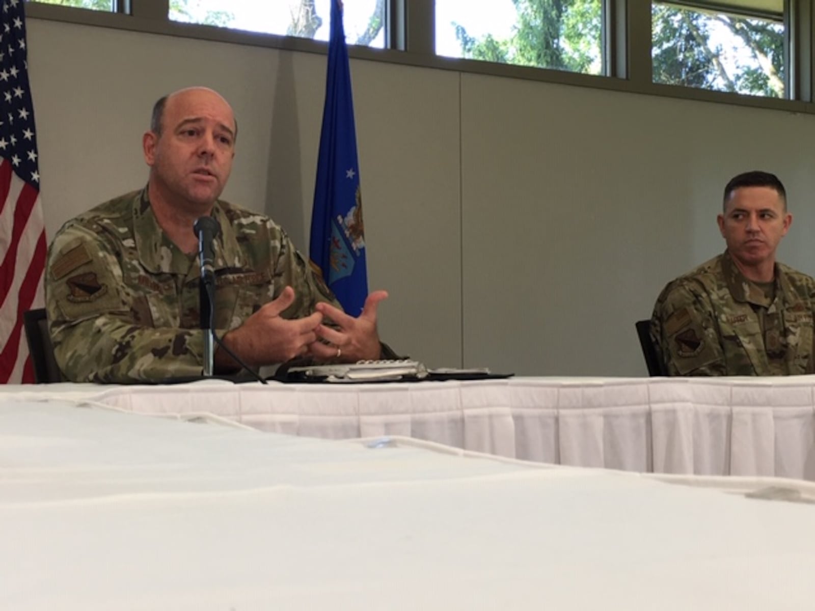 Air Force Col. Patrick Miller, left, with Chief Master Sgt. Jason Shaffer, meeting with the media for the first time Thursday. Miller became commander of the 88th Air Base Wing at the base in June. Shaffer joined him as command chief master sergeant of the wing in July. THOMAS GNAU/STAFF