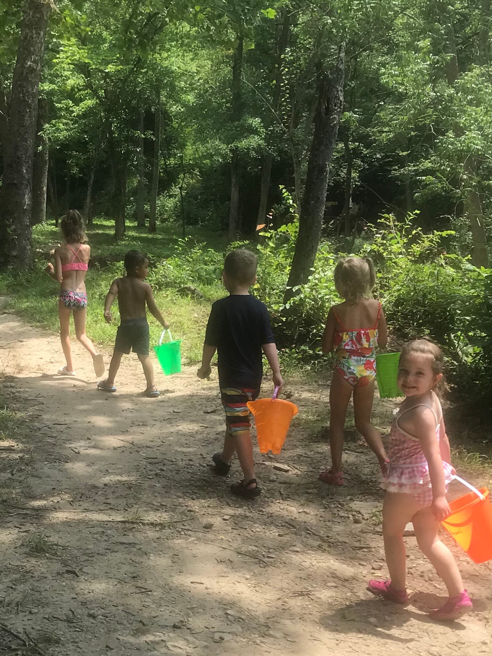 Children walk to the creek to play at Sycamore Trails Park in this file photo. The park is slated for upgrades in 2024.� Contributed photo / Teresa Nunery