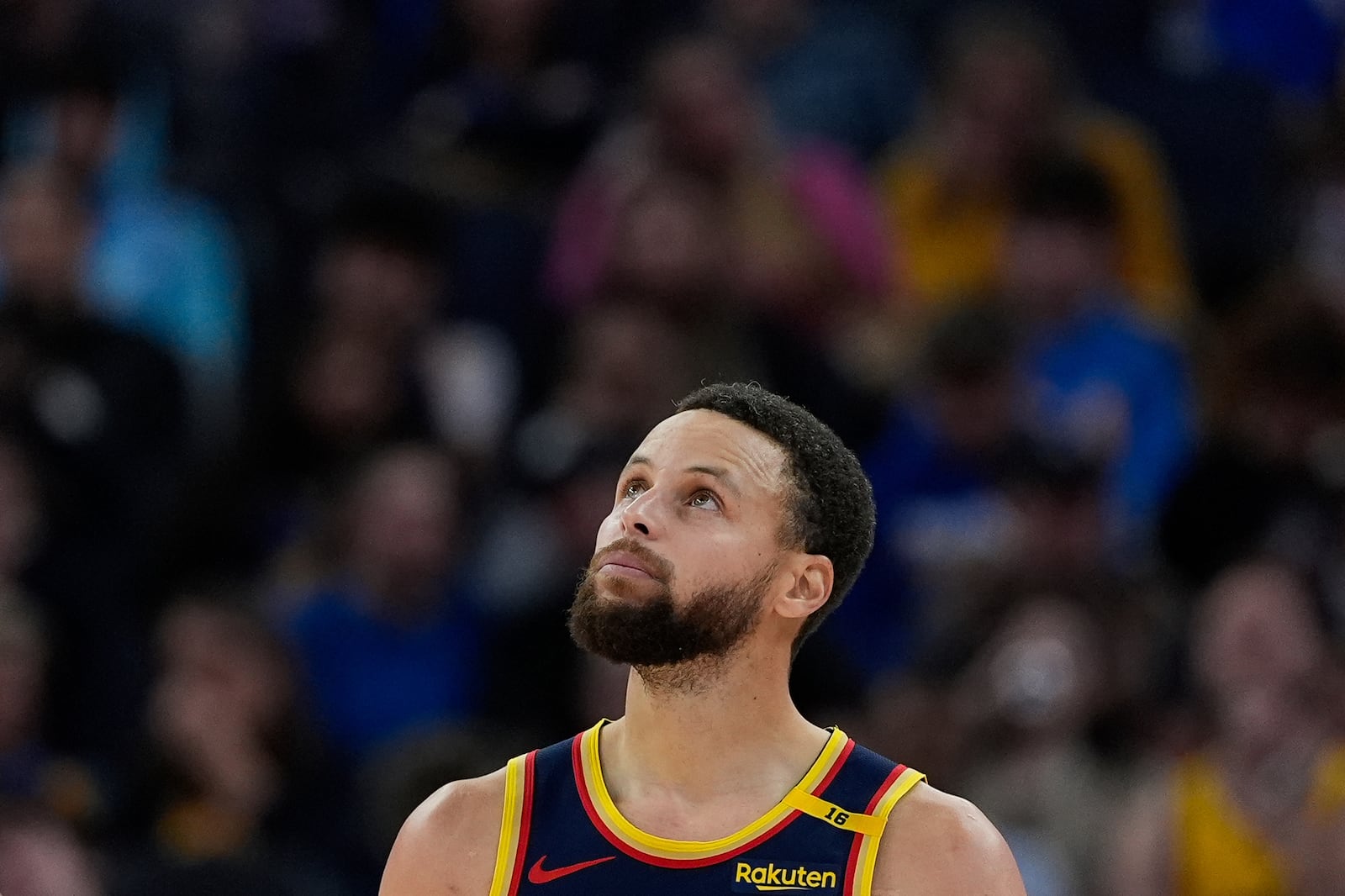 Golden State Warriors guard Stephen Curry looks to the scoreboard during the second half of an NBA basketball game against the Miami Heat, Tuesday, Jan. 7, 2025, in San Francisco. (AP Photo/Godofredo A. Vásquez)