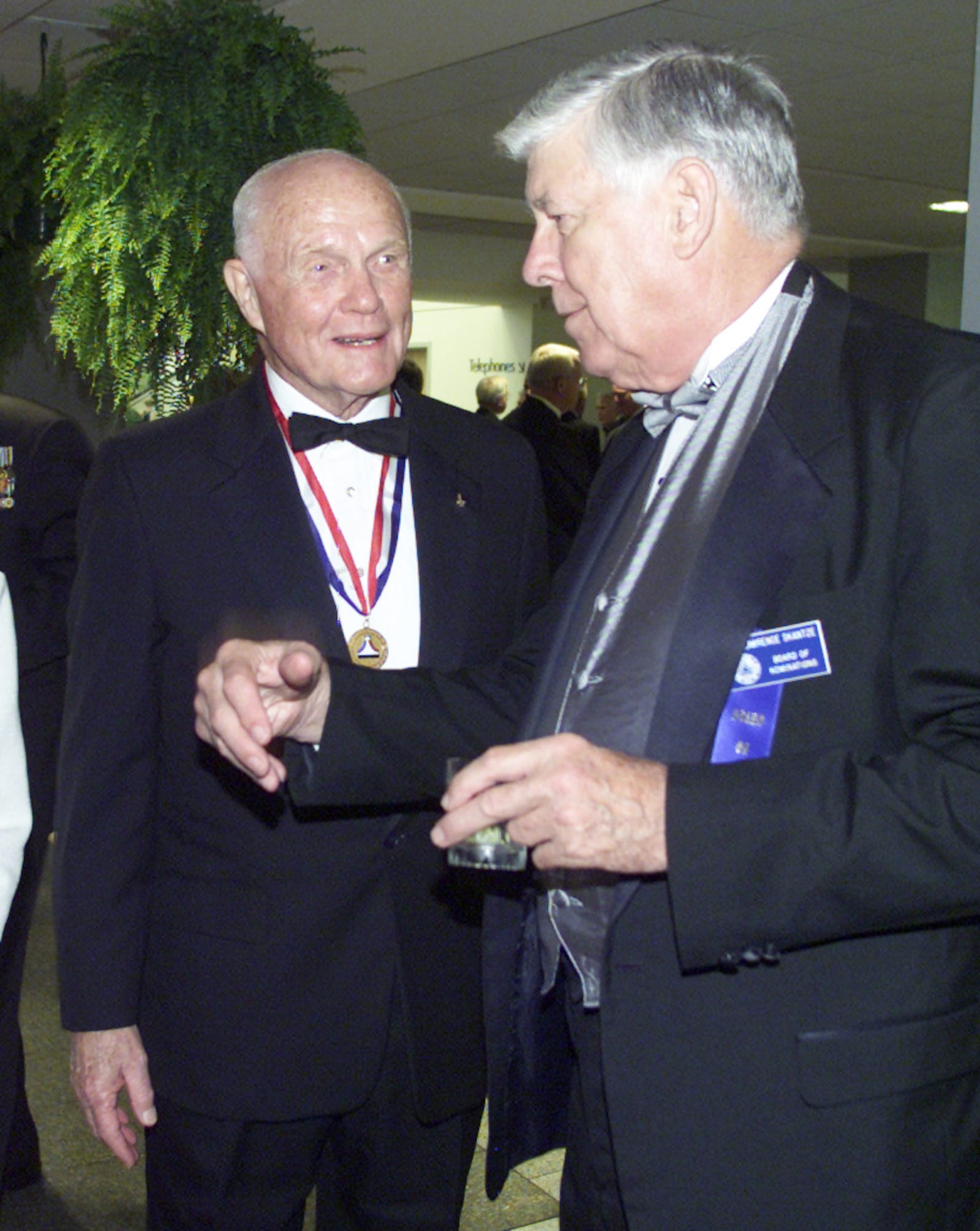 0722Halloffame-p2 Ohio State Senator John Glenn, left, chats with retired United States Air Force General Larry Skantze, right, during a reception for the National Aviation Hall of Fame induction ceremony held at the Dayton Convention Center, Saturday. Glenn, who is the oldest person to become a space shuttle astronaut, was inducted into the hall of fame in 1976.