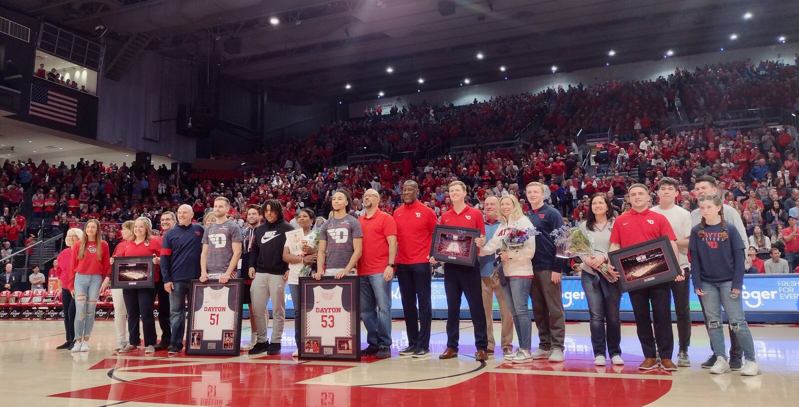 Dayton honors its seniors (two walk-ons on three managers) before a game against Davidson on Saturday, March 5, 2022, at UD Arena. David Jablonski/Staff