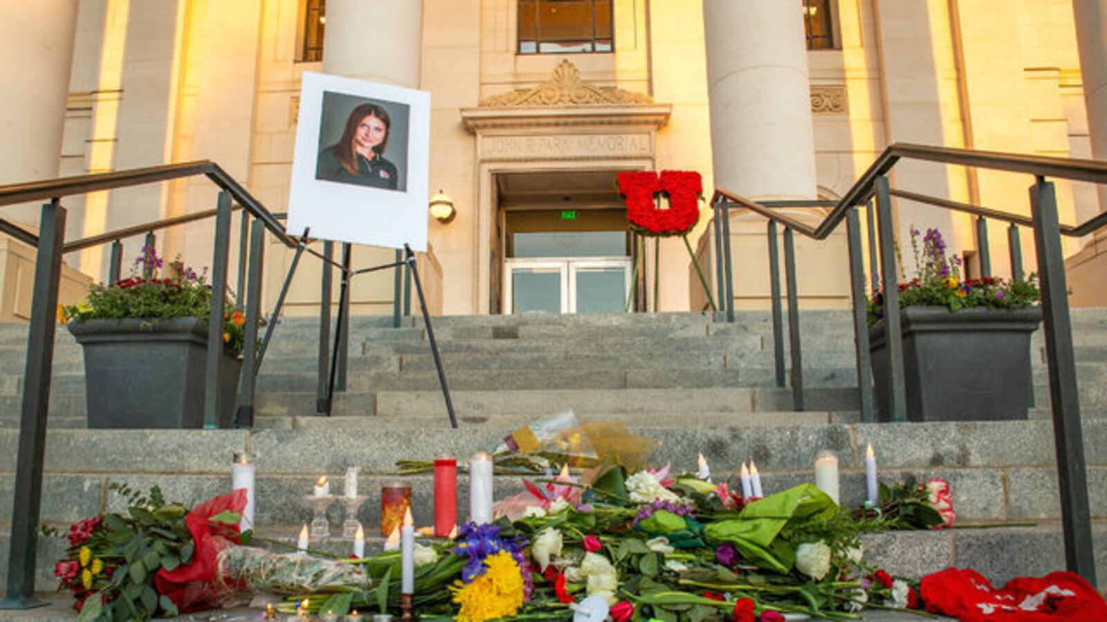 The remnants of a candlelight vigil for University of Utah student-athlete Lauren McCluskey, 21, are pictured. McCluskey was killed on campus by her ex-boyfriend, Melvin Shawn Rowland, 37, who then killed himself in a Salt Lake City church.