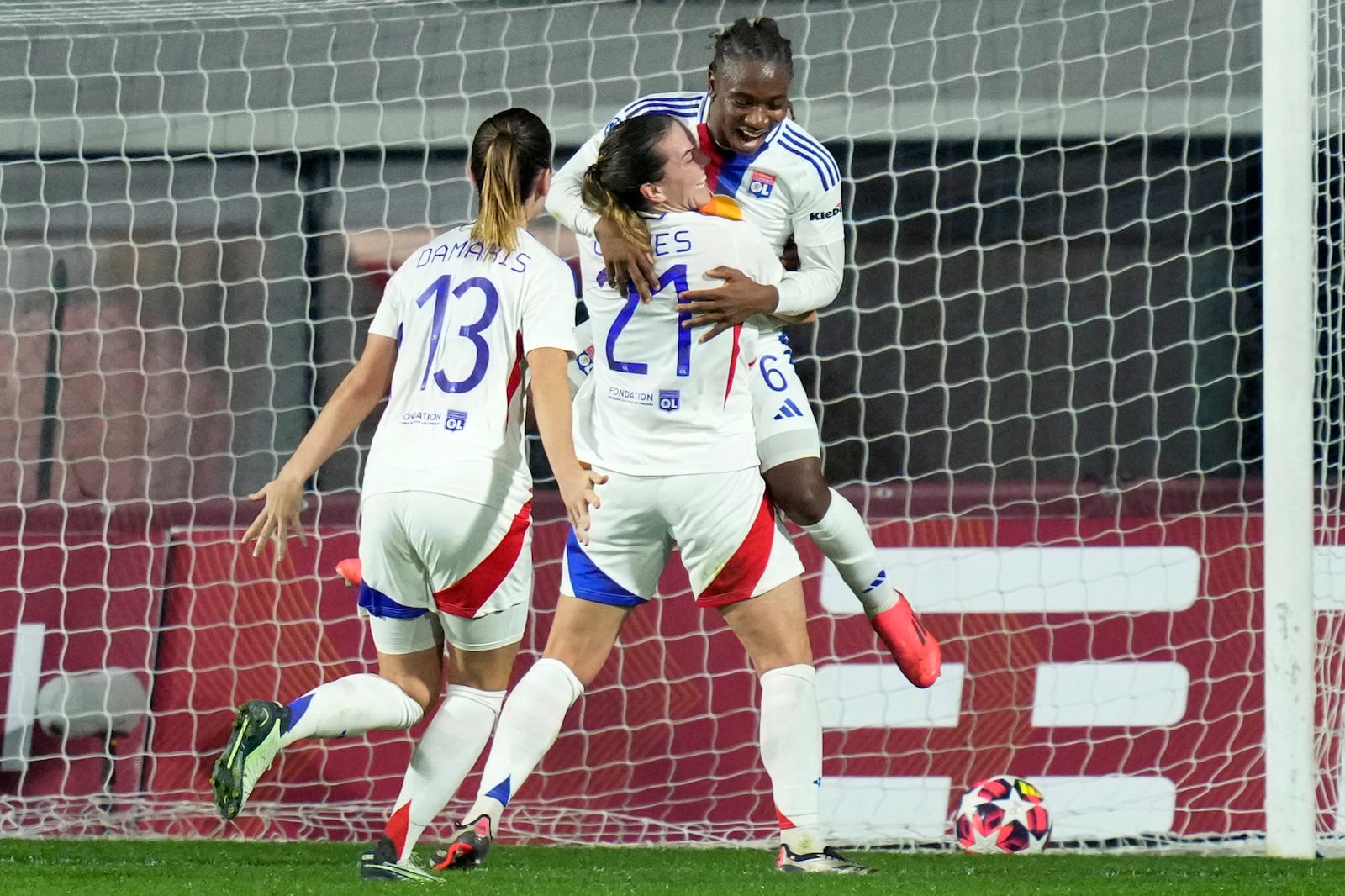 Olympique Lyonnais' Melchie Dumornay, top, celebrates after scoring the opening goal during the women's Champions League soccer match between AS Roma and Olympique Lyon in Rome, Italy, Wednesday, Nov. 13, 2024 (Photo by Alfredo Falcone/LaPresse via AP)