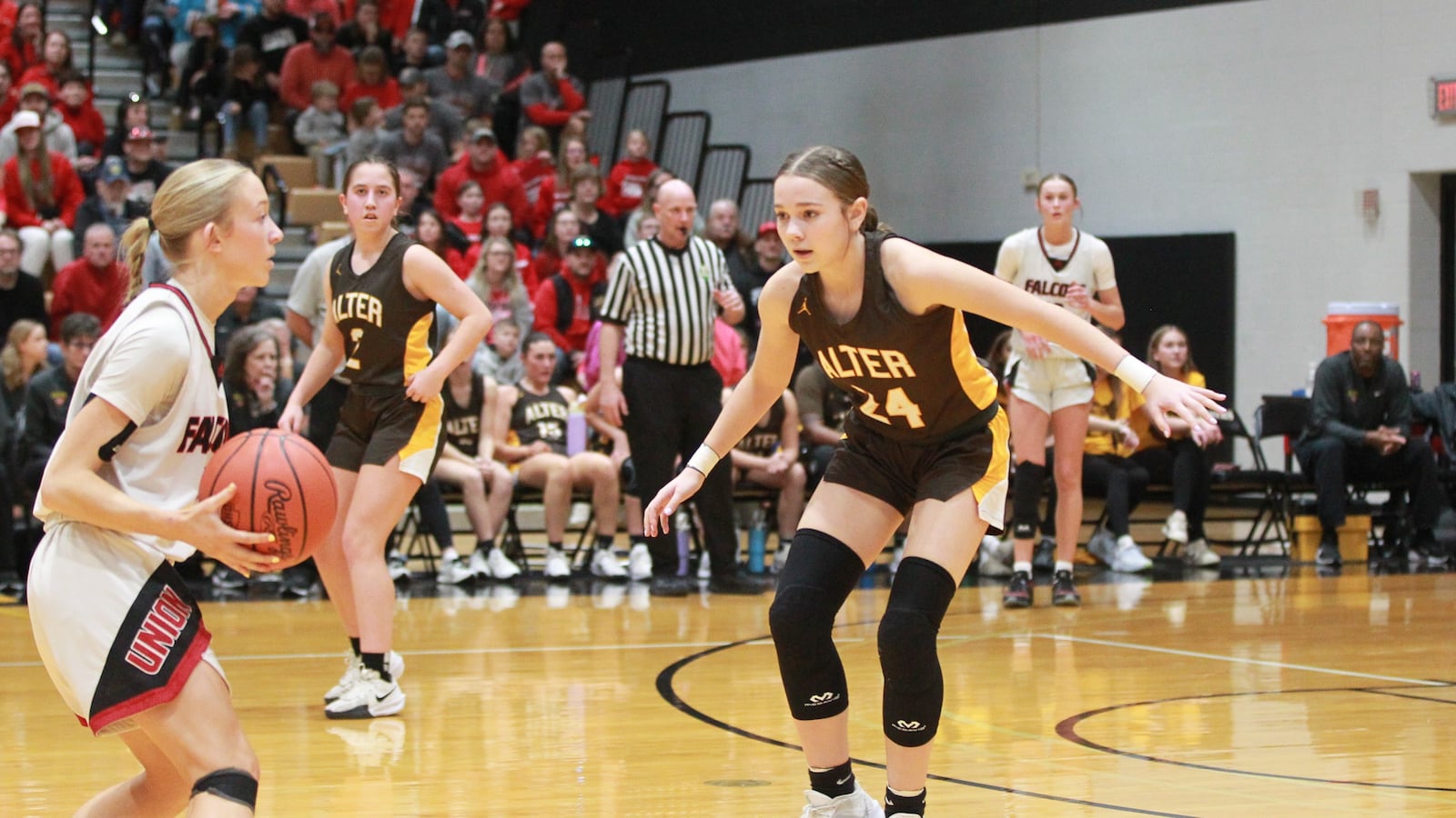 Alter's Grace Ireton defends during the Knights' win over Fairfield Union in a Division IV girls basketball state semifinal at Ohio Dominican in Columbus March 8, 2025. Marcus Hartman/STAFF