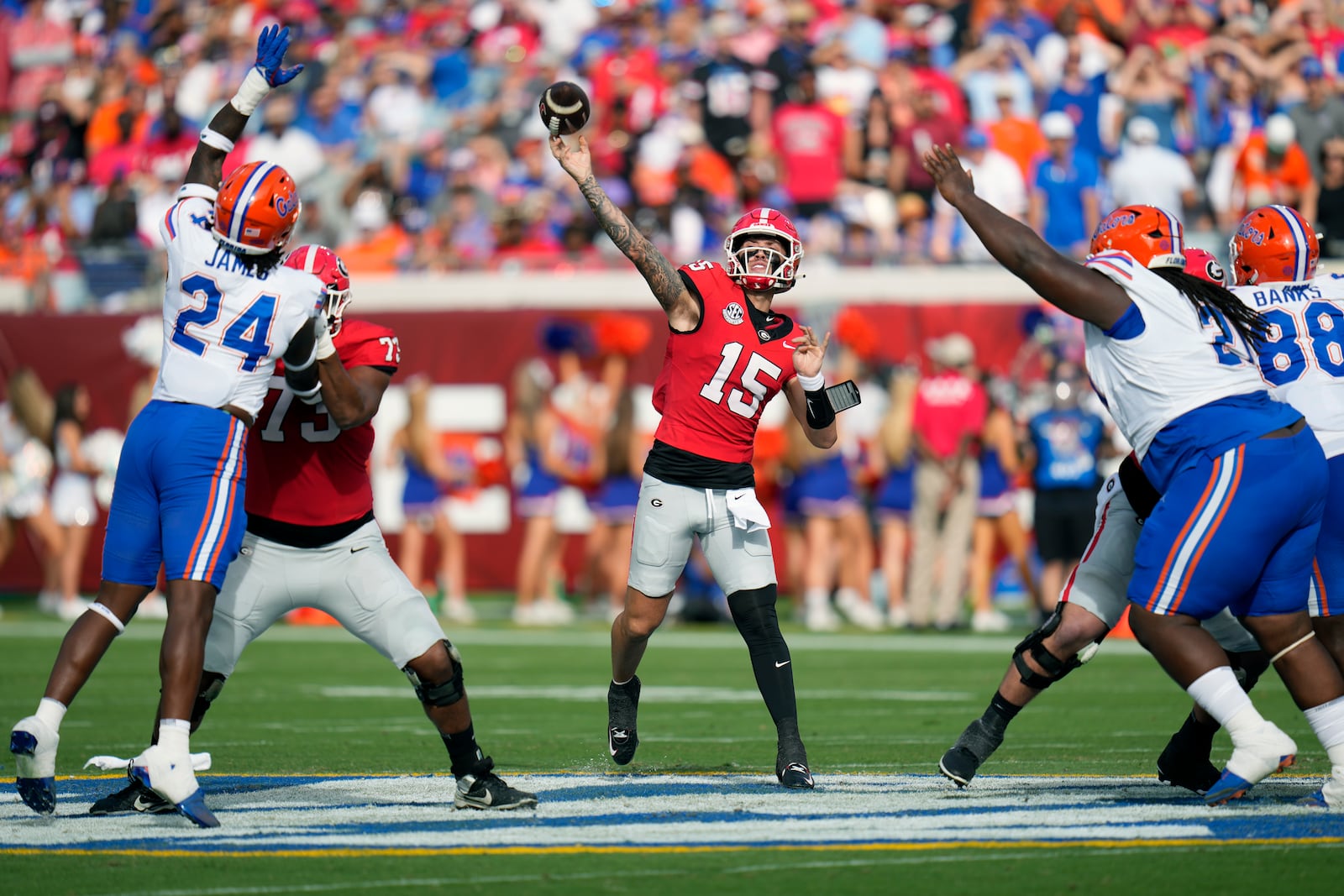 Georgia quarterback Carson Beck (15) throws a pass against Florida during the first half of an NCAA college football game, Saturday, Nov. 2, 2024, in Jacksonville, Fla. (AP Photo/John Raoux)