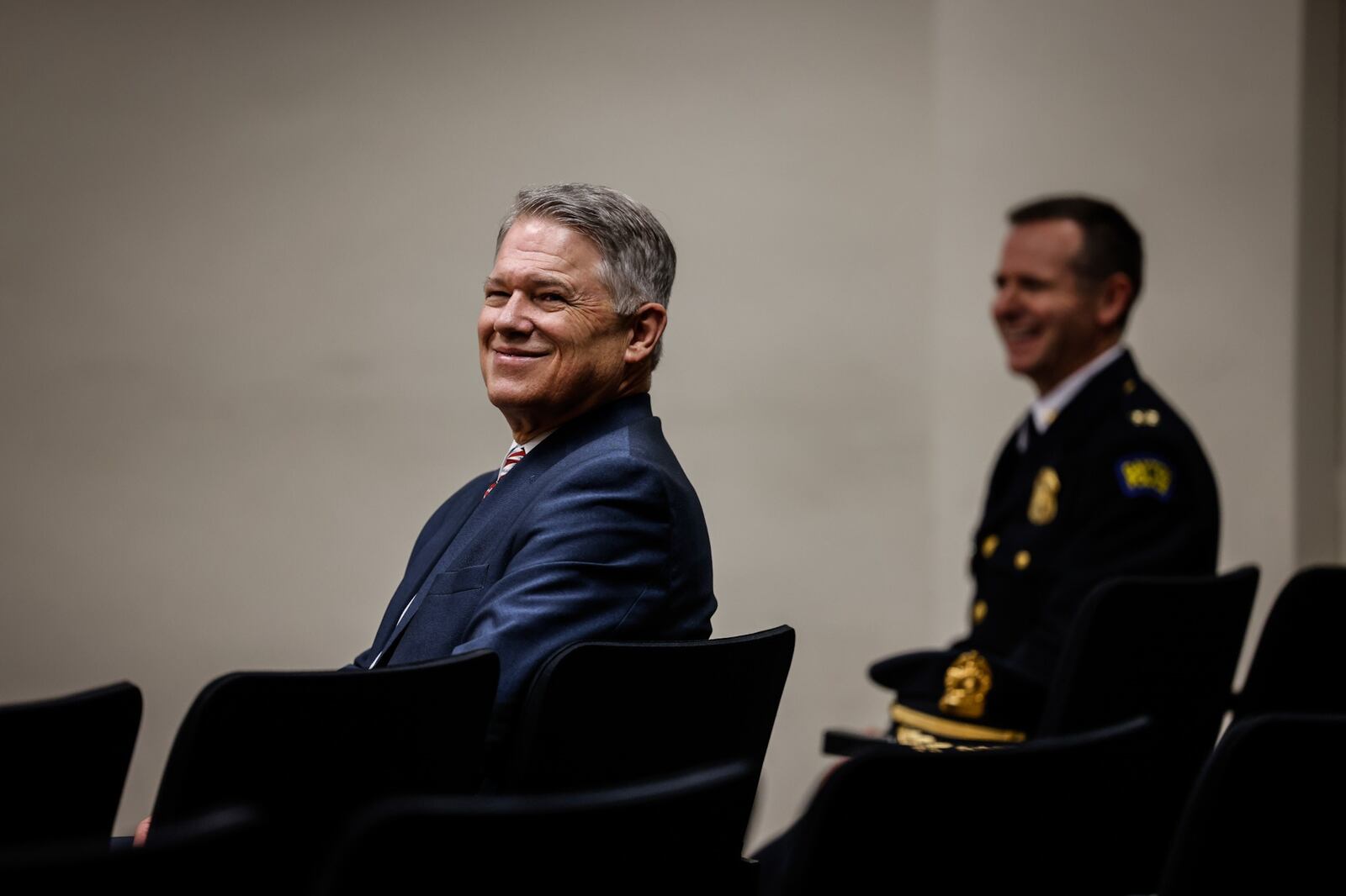 Retired Dayton police chief Richard Biehl attends the swearing-in of interim Dayton director and chief of police Matt Carper Friday July 30, 2021. JIM NOELKER/STAFF