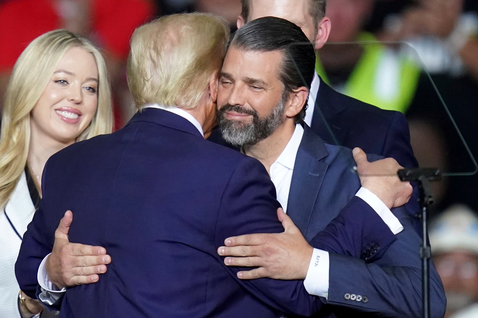 FILE - Republican presidential nominee former President Donald Trump hugs Donald Trump Jr., at a campaign rally at PPG Paints Arena, Nov. 4, 2024, in Pittsburgh. (AP Photo/Matt Freed, File)