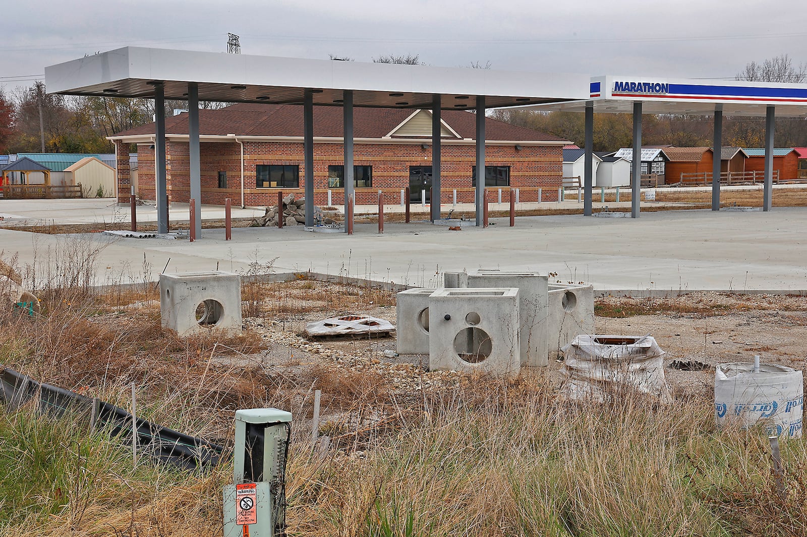 The Marathon gas station at the intersection of U.S. 40 and Ohio 235 in Clark County has been partially completed for over a year. BILL LACKEY/STAFF