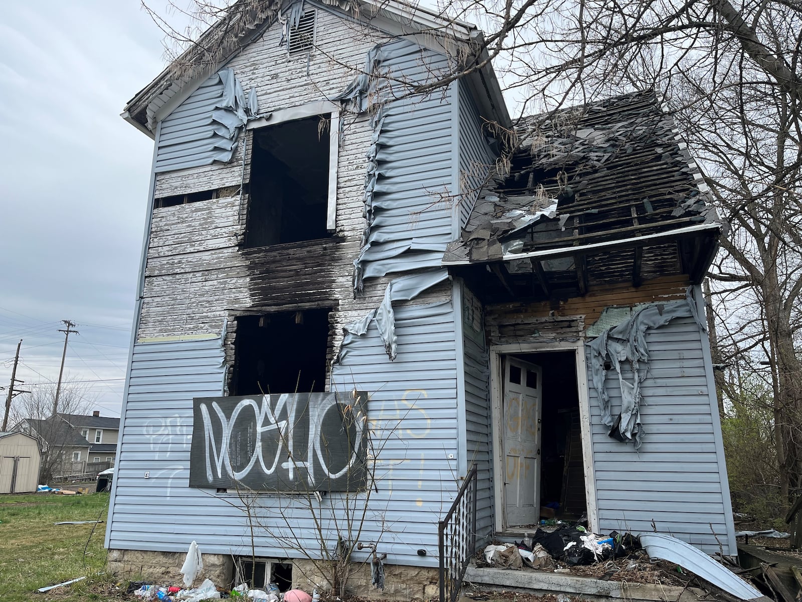 An abandoned home in East Dayton. CORNELIUS FROLIK / STAFF