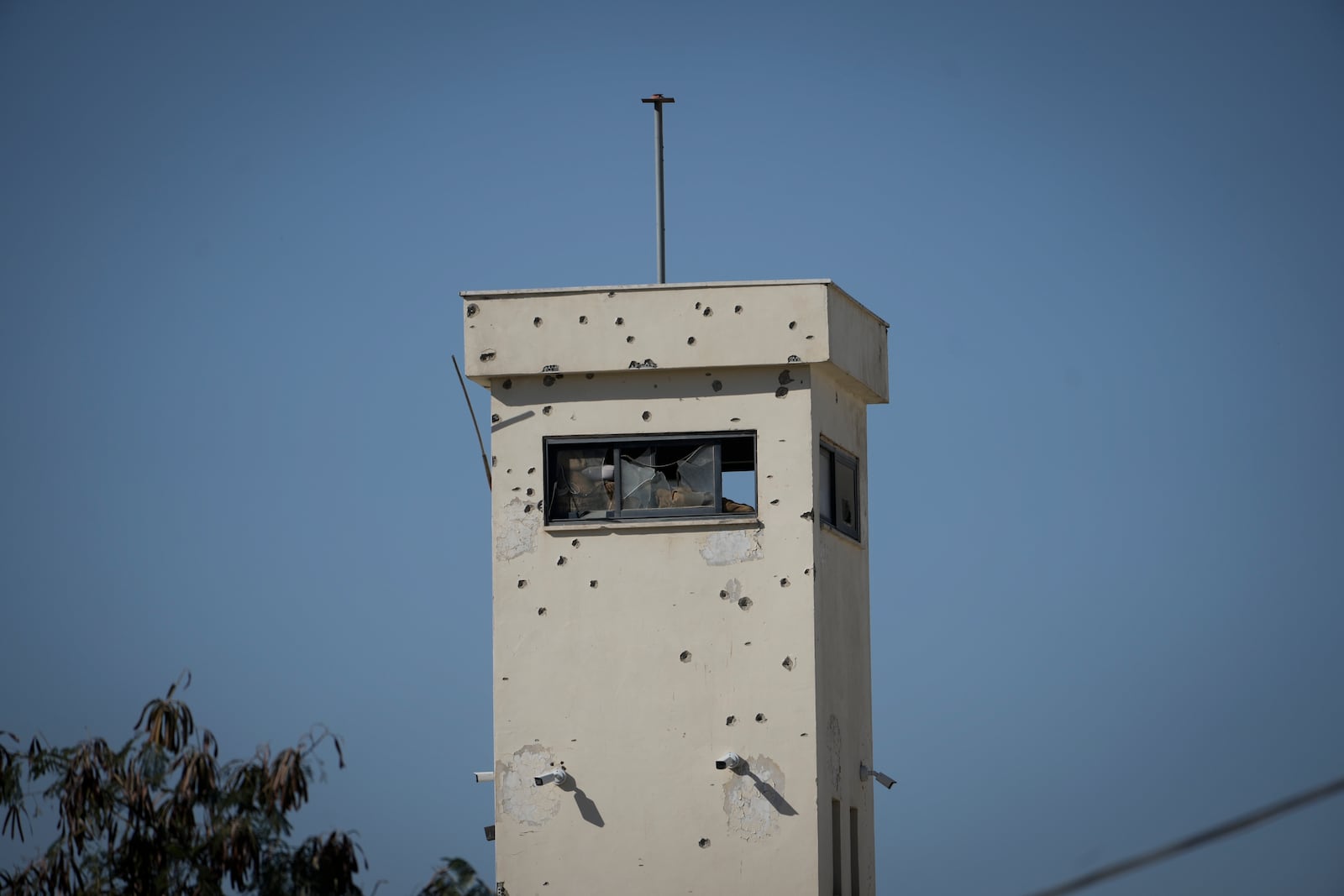 A Palestinian Authority watchtower is dotted with bulletholes after coming under militant fire during a raid by Palestinian security forces on the Jenin refugee camp in the Israeli-occupied West Bank, Dec. 16, 2024 (AP Photo/Majdi Mohammed).