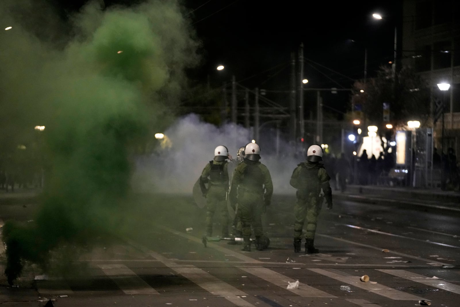 Riot police operate during clashes, as the Greek opposition parties have challenged the country's center-right government with a censure motion in parliament over a devastating rail disaster nearly two years ago, in Athens, Wednesday, March 5, 2025. (AP Photo/Petros Giannakouris)