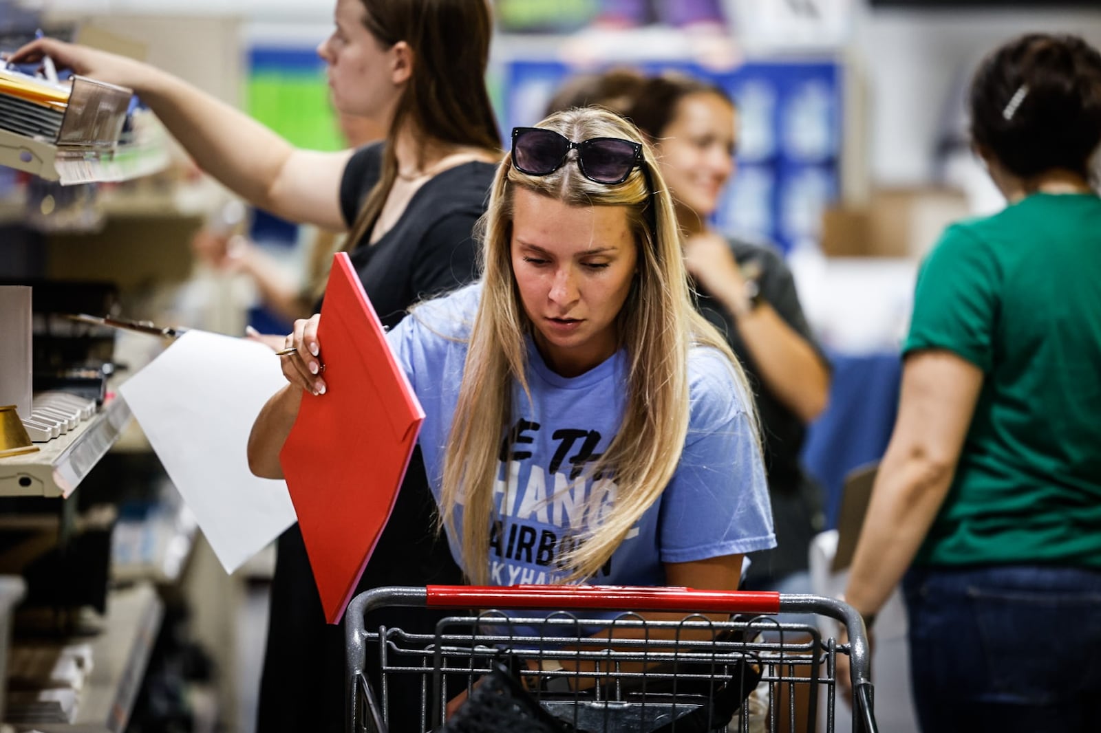 Wright State University graduate Cassidy Hale along with dozens of other soon to be teachers stock-up on supplies for their first year classrooms at Crayons to Classrooms. Hale plans to teach in Fairborn. JIM NOELKER/STAFF