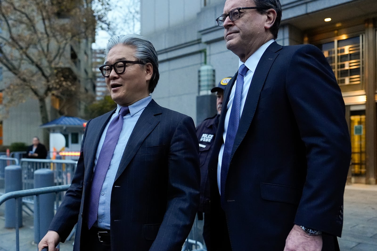 Bill Hwang, left, founder of Archegos Capital Management, departs federal court, Wednesday, Nov. 20, 2024, in New York. (AP Photo/Julia Demaree Nikhinson)