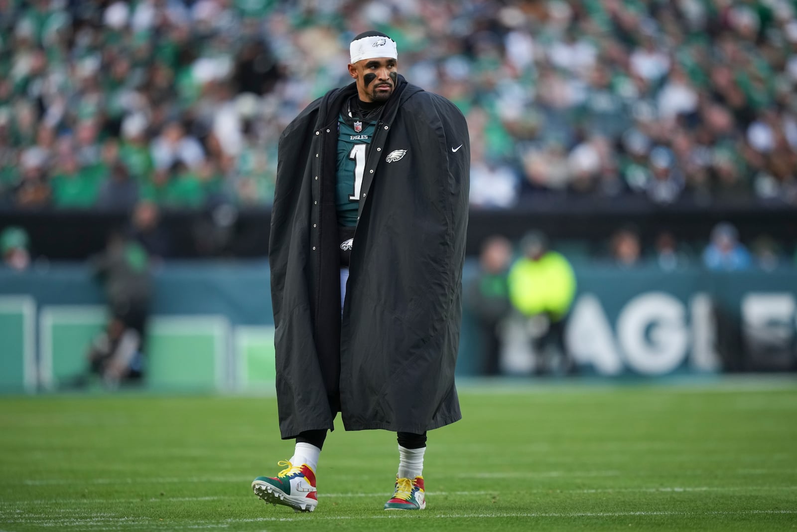 Philadelphia Eagles quarterback Jalen Hurts (1) watches after Philadelphia Eagles safety C.J. Gardner-Johnson is injured during the second half of an NFL football game against the Carolina Panthers on Sunday, Dec. 8, 2024, in Philadelphia. (AP Photo/Matt Slocum)