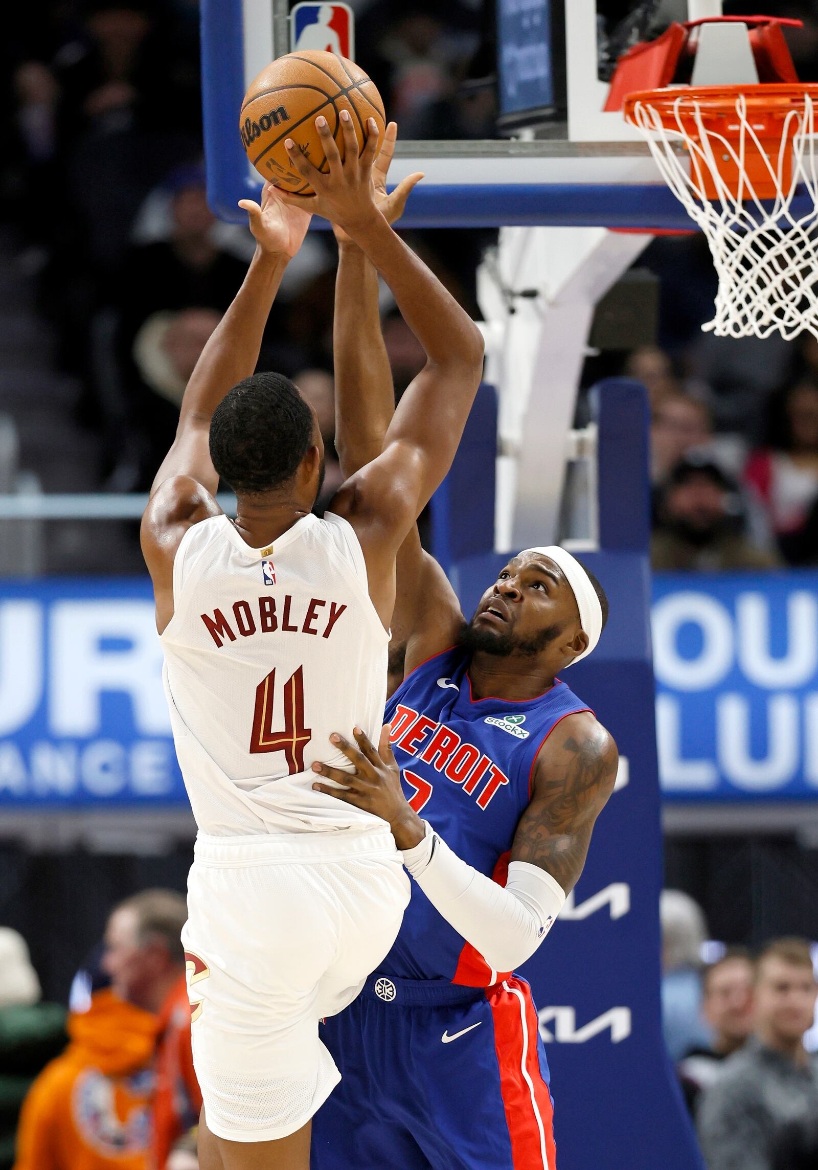 Detroit Pistons forward Paul Reed (7) defends against shot by Cleveland Cavaliers forward Evan Mobley (4) during the first half of an NBA basketball game Wednesday, Feb. 5, 2025, in Detroit. (AP Photo/Duane Burleson)