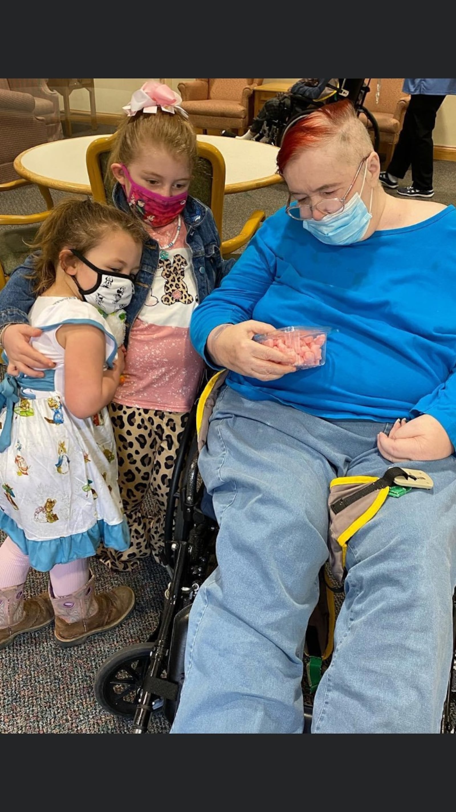 (Left to right) Moira Garrett, 3, and Edith Garret, 7, visit their great-grandmother Sherry Agnos for the first time in over a year. During the COVID-19 pandemic, visits were not allowed at Dayspring of Miami Valley, a nursing home in Fairborn. Submitted photo.