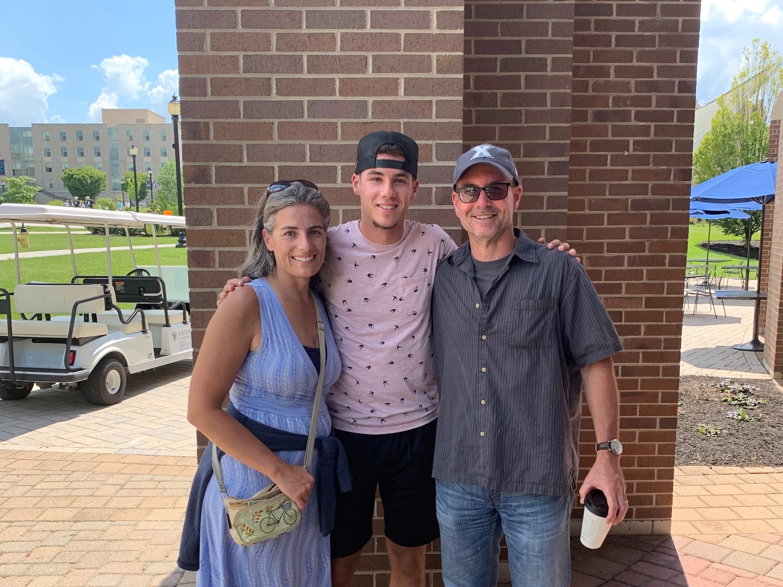 Lucas Mattison with his mother, Rachel, and father, Mike Mattison. CONTRIBUTED