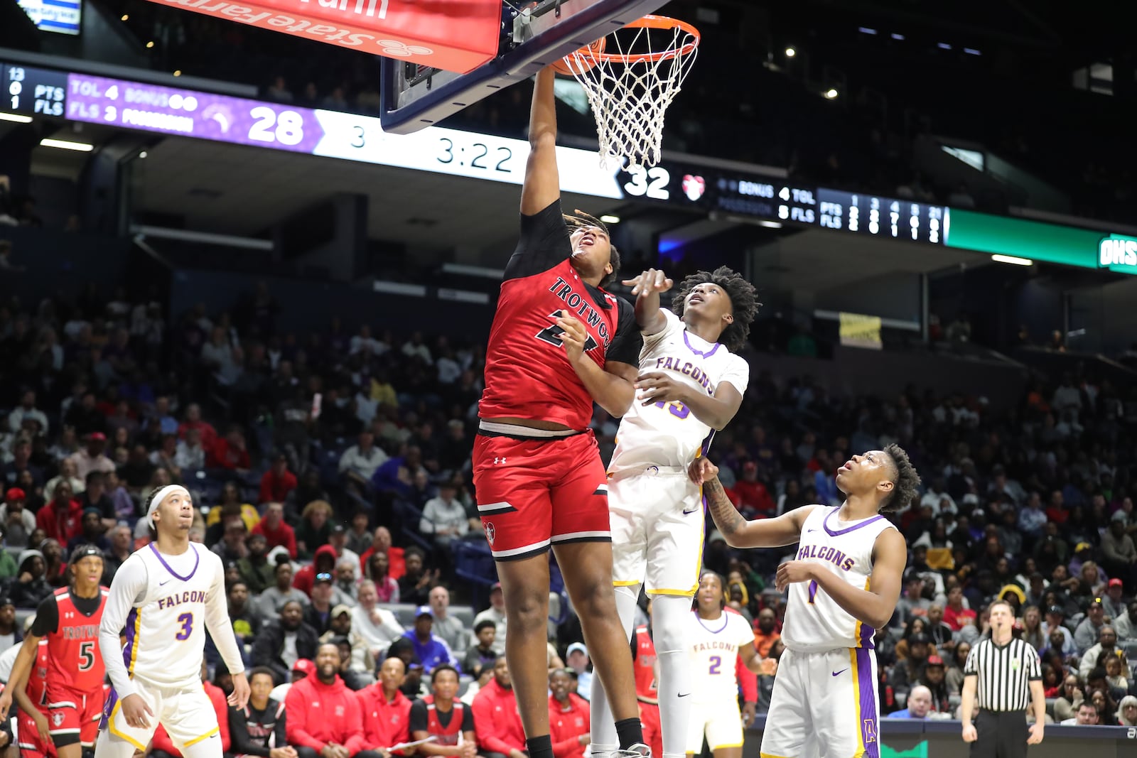 The Trotwood High School boys basketball team fell to Aiken 71-50 in a Division III regional final game on Sunday, March 9 at Xavier University's Cintas Center. MICHAEL COOPER/STAFF