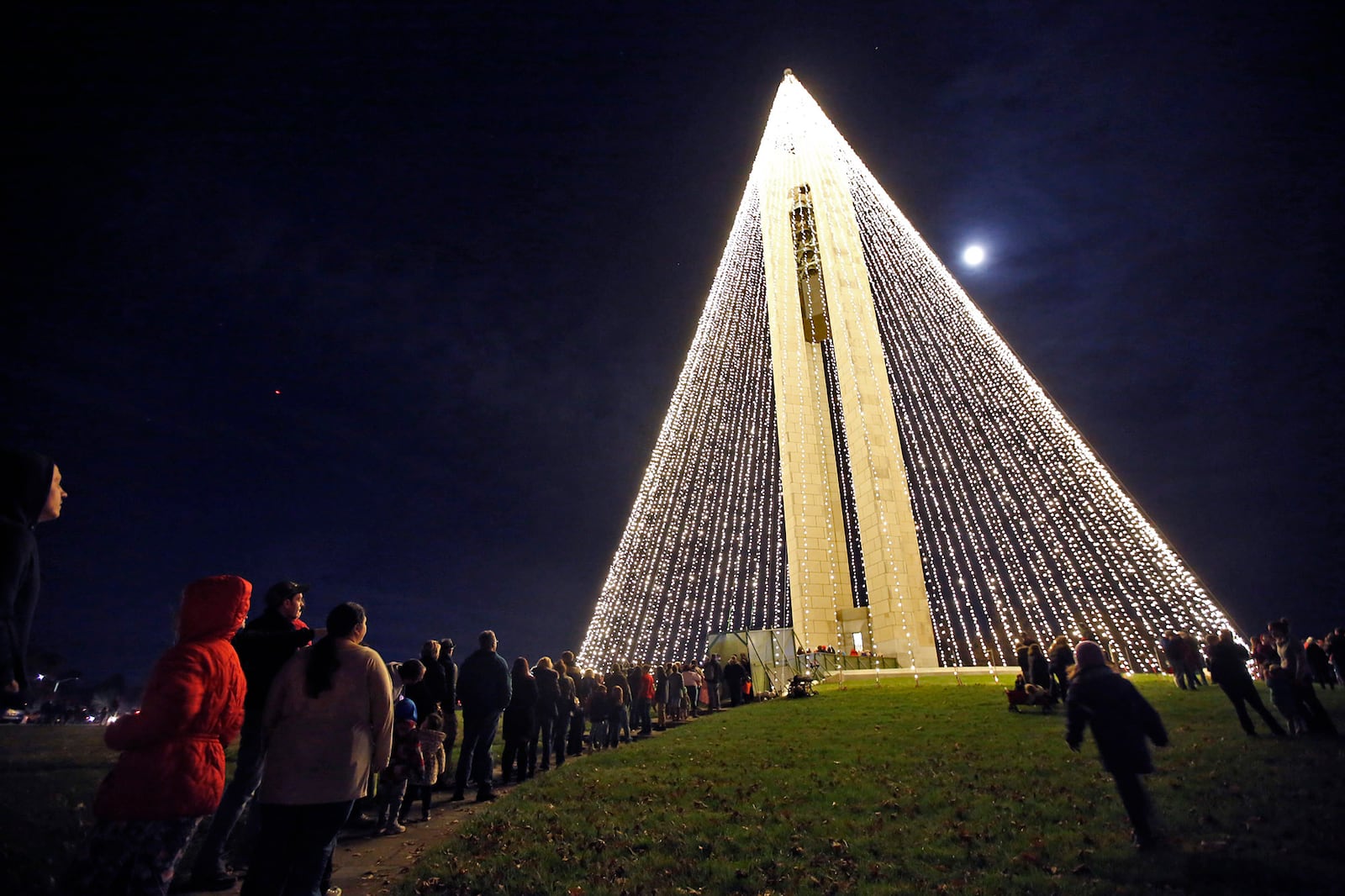 The 20,000-light Carillon Holiday Tree was lit on Wednesday evening to kick off the Holiday festivities at Carillon Historic Park and Dayton History.  TY GREENLEES / STAFF