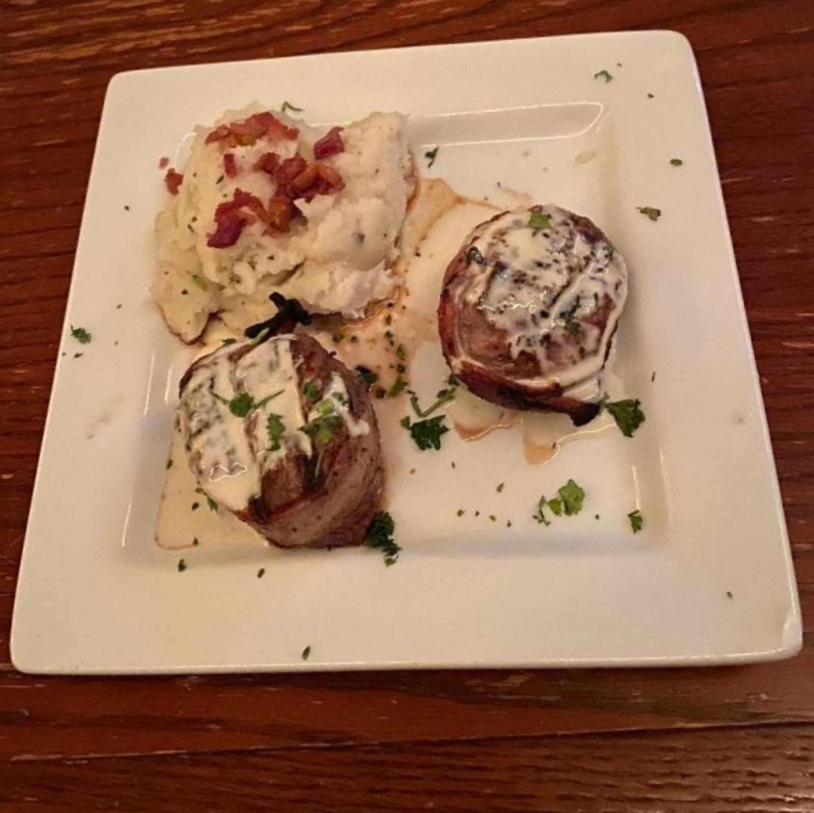 Sweeney's Seafood's Bacon Week specials Aug. 15-22 include a Bacon Wrapped Filet Mignon meal with two 4 oz. Bacon-wrapped Filet Medallions topped with House-Made Gorgonzola Cheese Sauce served with House-Made Bacon White Truffle Mashed Potatoes and Salad. CONTRIBUTED