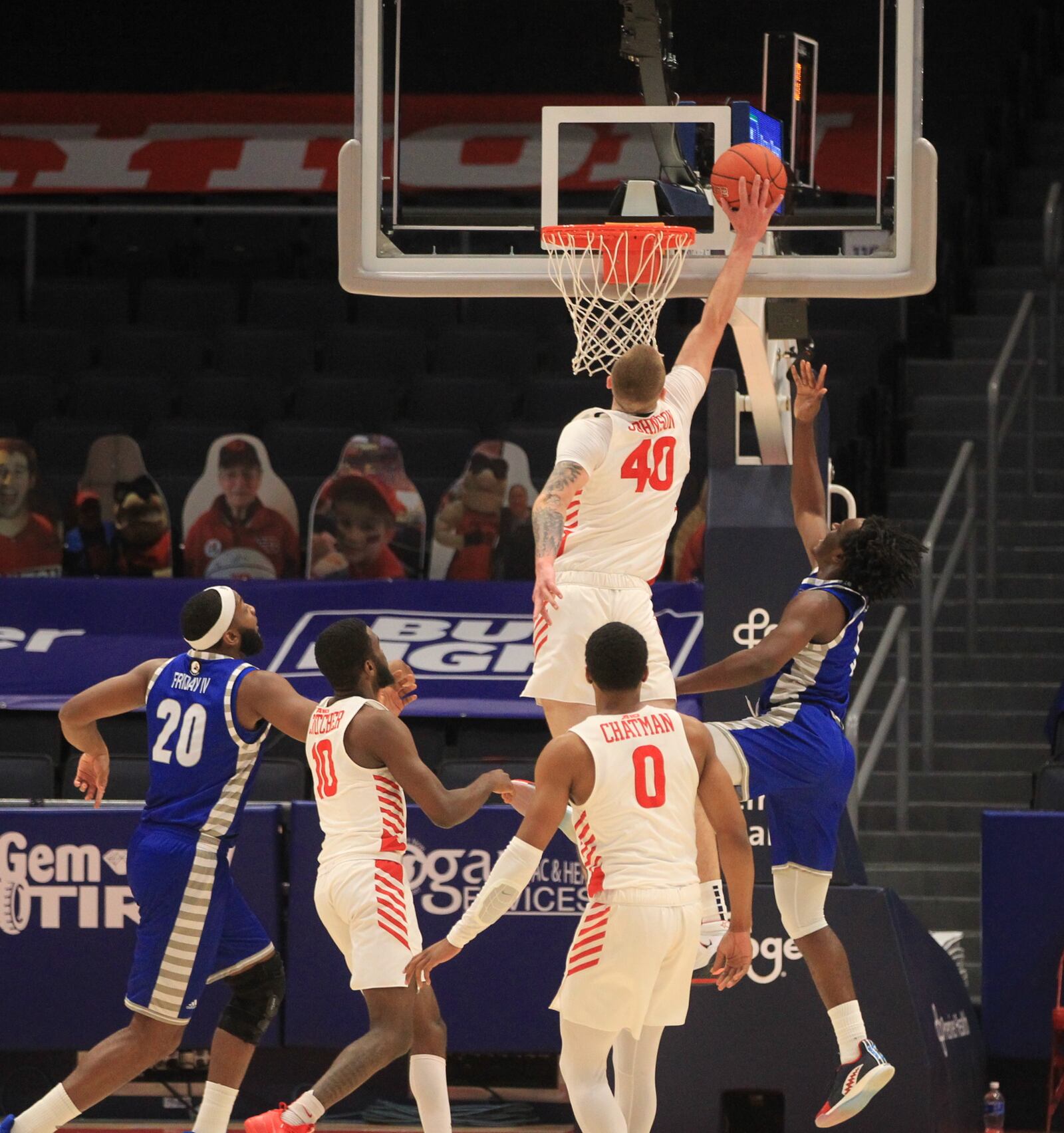 Dayton's Chase Johnson blocks a shot against Eastern Illinois on Tuesday, Dec. 1, 2020, at UD Arena. David Jablonski/Staff