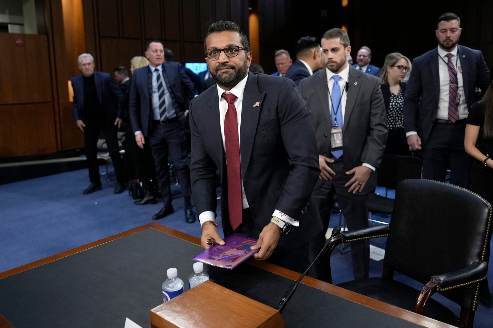 Kash Patel, President Donald Trump's choice to be director of the FBI, departs following a confirmation hearing before the Senate Judiciary Committee at the Capitol in Washington, Thursday, Jan. 30, 2025. (AP Photo/Ben Curtis)