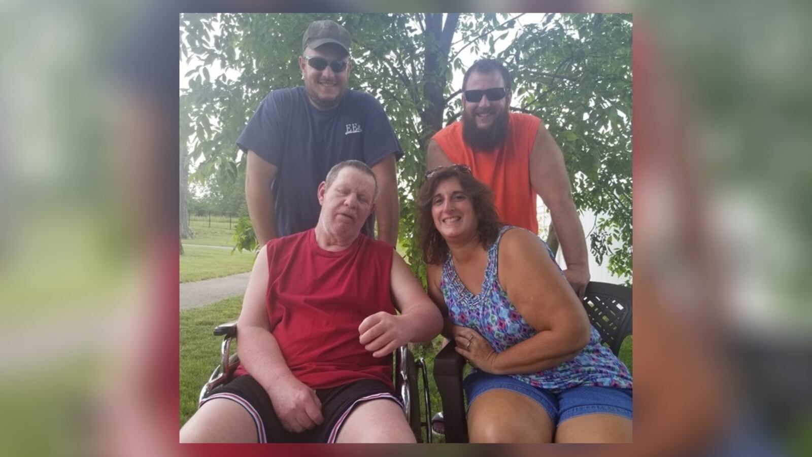 Randy Barnett sits next to wife Sandy Barnett, with their sons Joe, left, and Josh, right, standing behind them. CONTRIBUTED