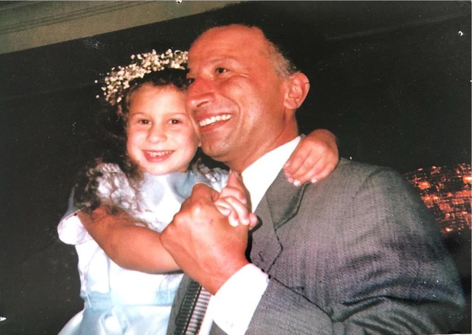 Chloe Zelkha, co-founder of the COVID Grief Network for Young Adults, is pictured with her father who died suddenly when she was 26. CONTRIBUTED