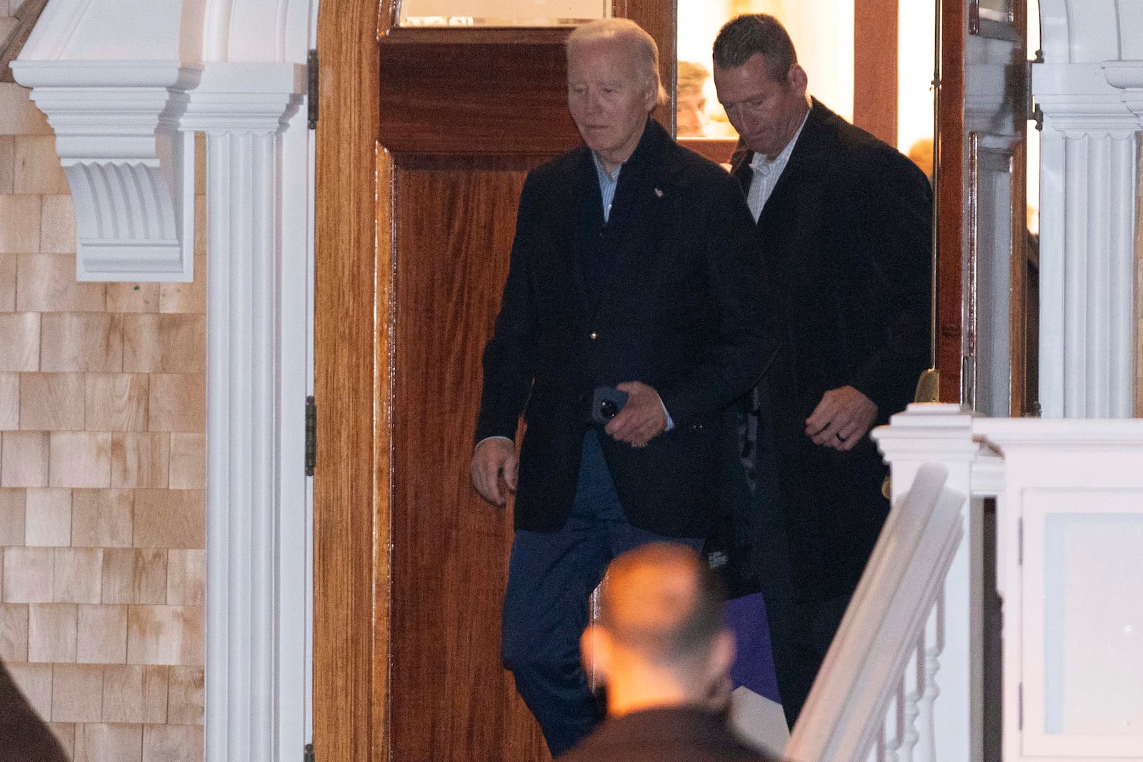 President Joe Biden steps out of St. Mary, Our Lady of the Isle Catholic Church in downtown Nantucket, Mass., Saturday, Nov. 30, 2024. (AP Photo/Jose Luis Magana)